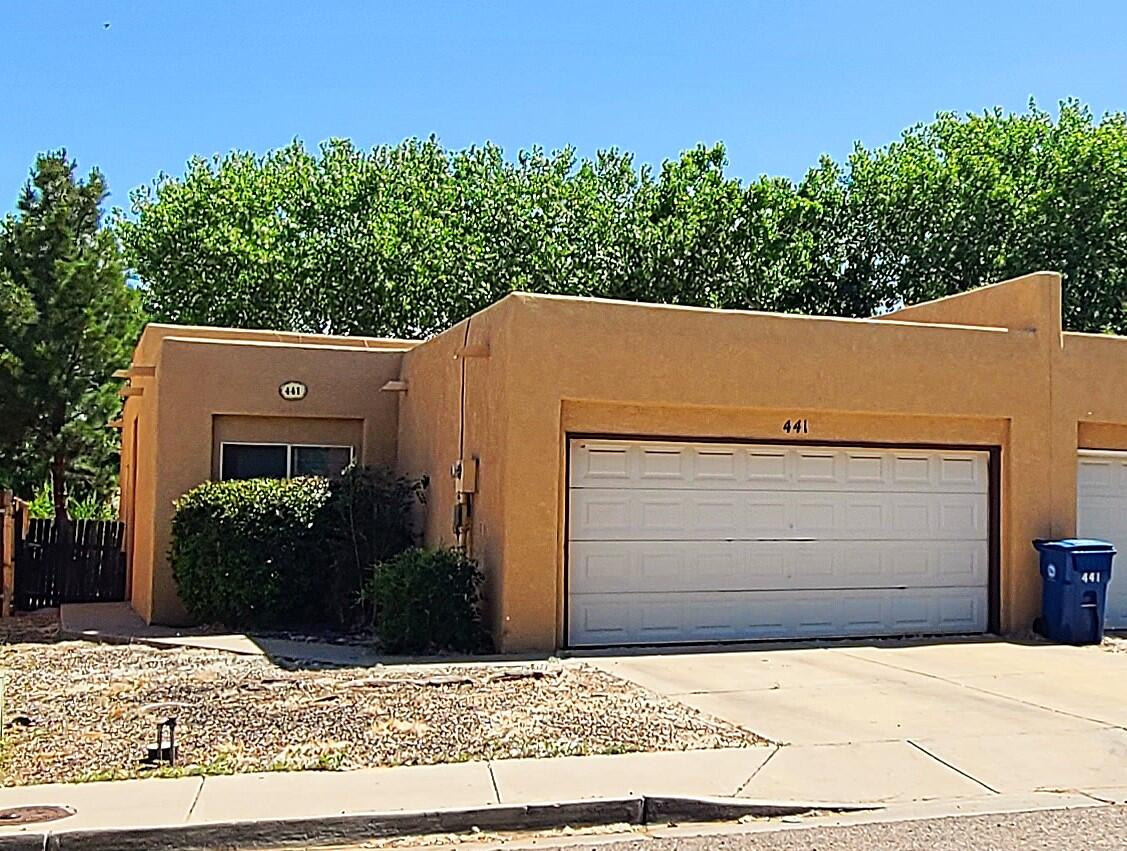 Coming Soon--Great Opportunity in Los Lunas! This well-maintained 3-bedroom, 2-bathroom townhouse with an oversized 2-car garage is located in the heart of the growing Village of Los Lunas--just off Hwy 314, near the Railrunner, in a quiet, tree-lined neighborhood with no HOA. The single-story layout features tile flooring throughout, a fully fenced, low-maintenance backyard perfect for pets or entertaining. Whether you're looking for a smart investment property or a primary residence, this home checks all the boxes. With full list price offer, Seller will deep clean, paint, landscape and install brand-new SS kitchen appliances after the tenant vacates. Centrally located and move-in ready, homes like this don't last--schedule your showing today! Available July 2025.