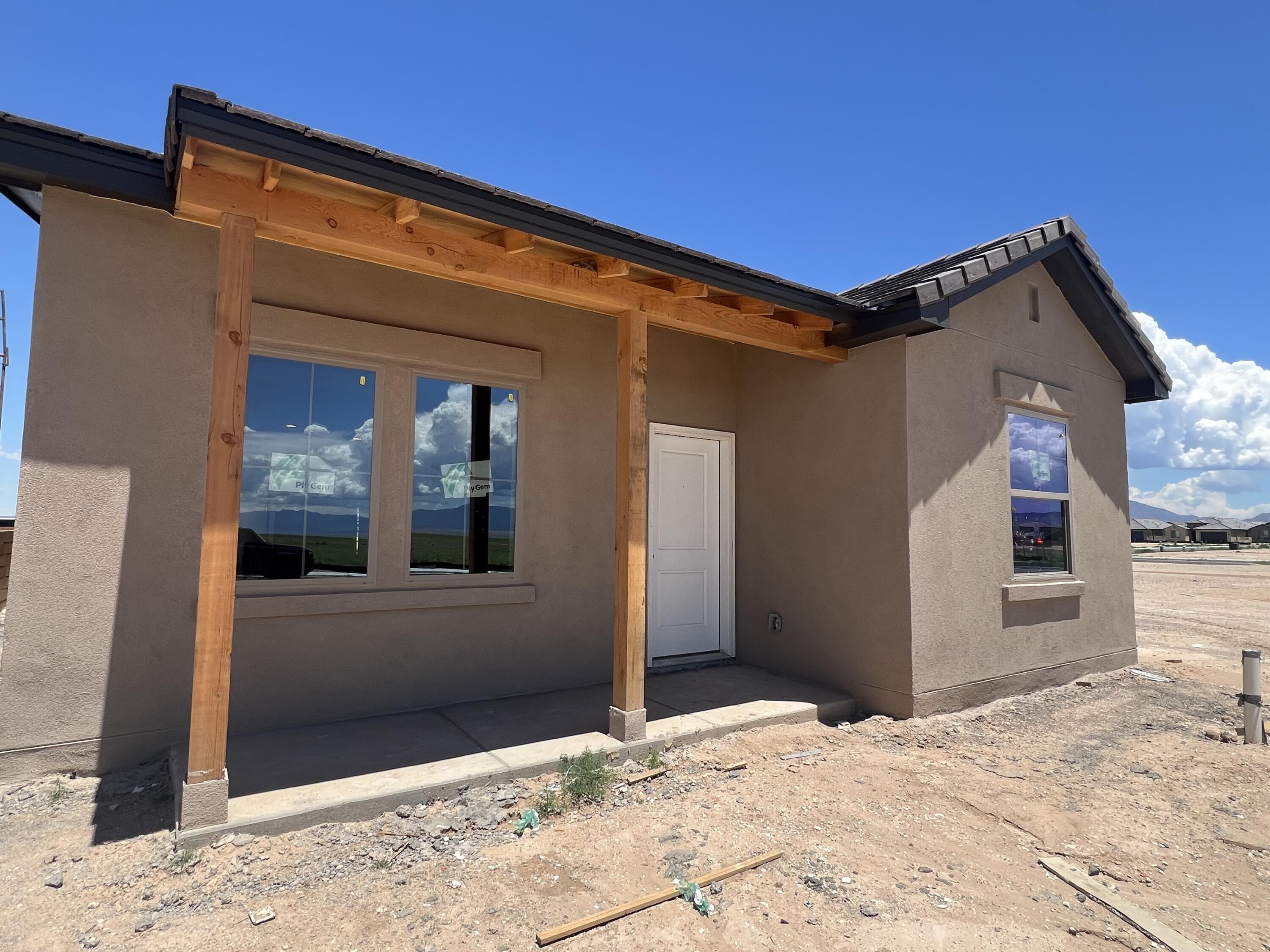 This 3-bedroom gem located in the heart of Mesa del Sol - M4. With a welcoming front porch and a shaded back patio, you'll have the perfect spots to enjoy those unbeatable New Mexico mornings and golden sunsets.&#9989; Covered Front Porch + Covered Back Patio - Double the outdoor space, double the relaxation&#9989; Upgraded Quartz Countertops - Modern elegance that's easy to maintain&#9989; SPC Flooring - Stylish, durable, and pet/kid-friendly&#9989; Overhead Garage Storage - Keep your essentials out of sight but within reach&#9989; Bright, Airy Layout - Filled with natural light and cozy energy