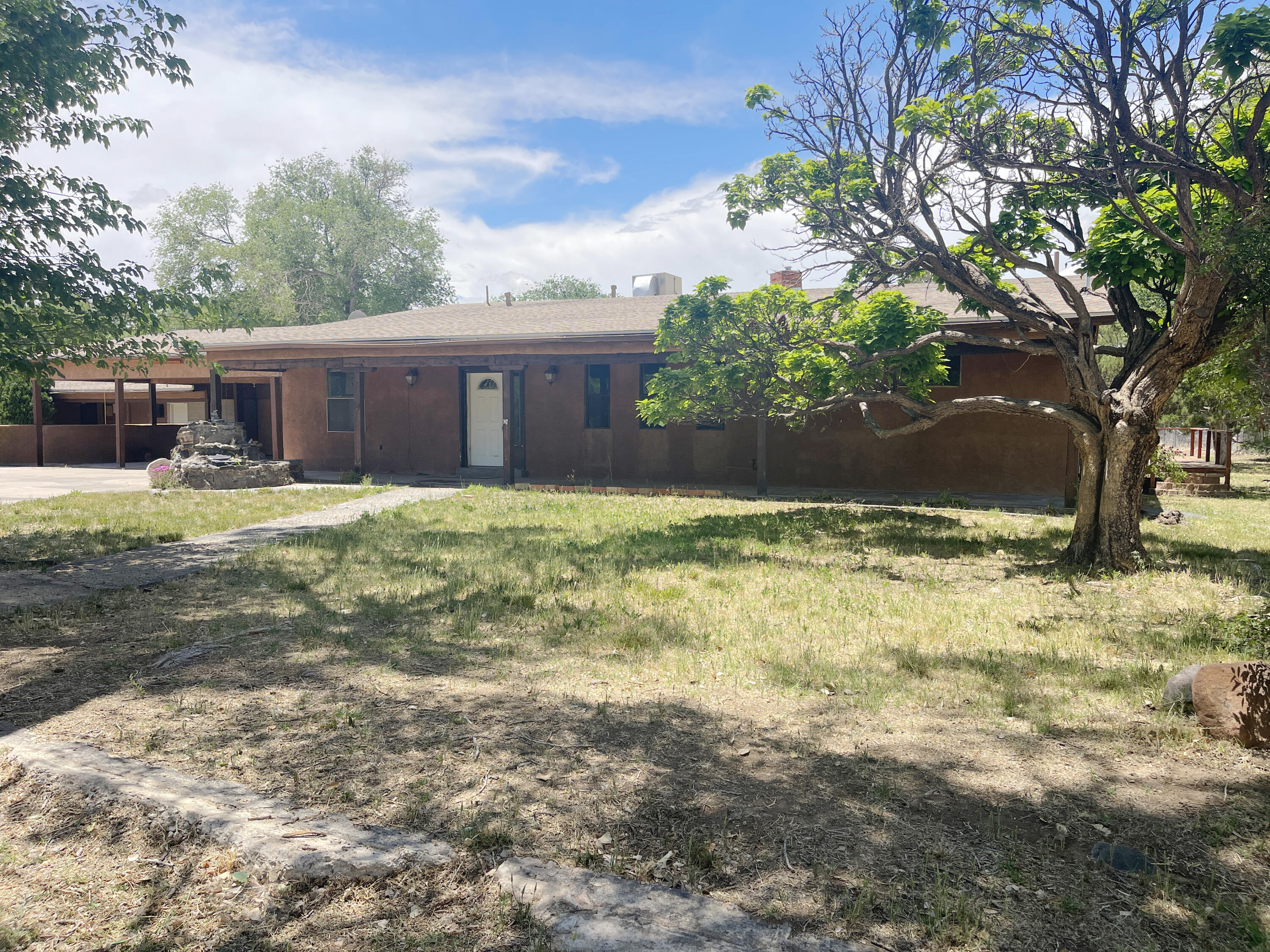Great Potential Opportunity! This home is located in a desirable area featuring larger lots, farming, and the ability to keep farm animals. It is situated on 1.67 acres and includes three separate properties. The main home offers 3 bedrooms, 2 bathrooms, 2 fireplaces, and 2 living areas. The second privates quaters is a 1 bedroom, and 1 bath. The caregiver/private home has 1 bedroom, and 1 bath.