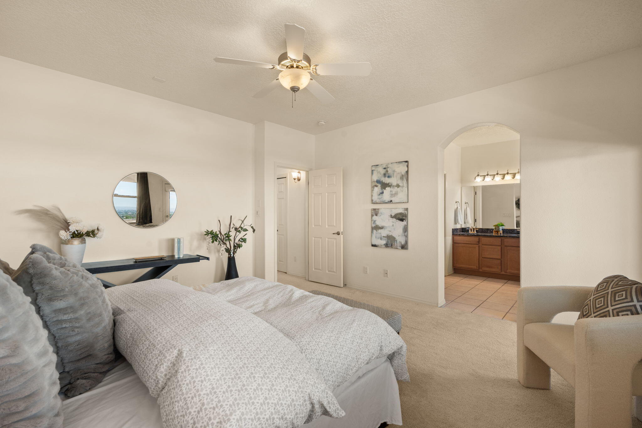 What a great location!  Sophisticated Twilight Homes townhome overlooking the city lights and downtown, close to I 40 for easy access to hospitals, shopping, the base, and schools.  Energy efficient  and open floor plan with cozy fireplace for quiet evenings.  Go upstairs for balconies both front and back to enjoy the city lights and the majestic unobstructed mountain views!  Three bedrooms plus a bonus area for crafts, toys, reading, studying, whatever you choose and need!  Each bedroom has access to a balcony! Gorgeous custom cabinets, granite countertops, stainless appliances in kitchen.  Blackout curtains in primary suite with spa-like ensuite including garden tub and separate shower, walk-in closet.  Wonderful investment.  Seller financing available.  Call broker for details.