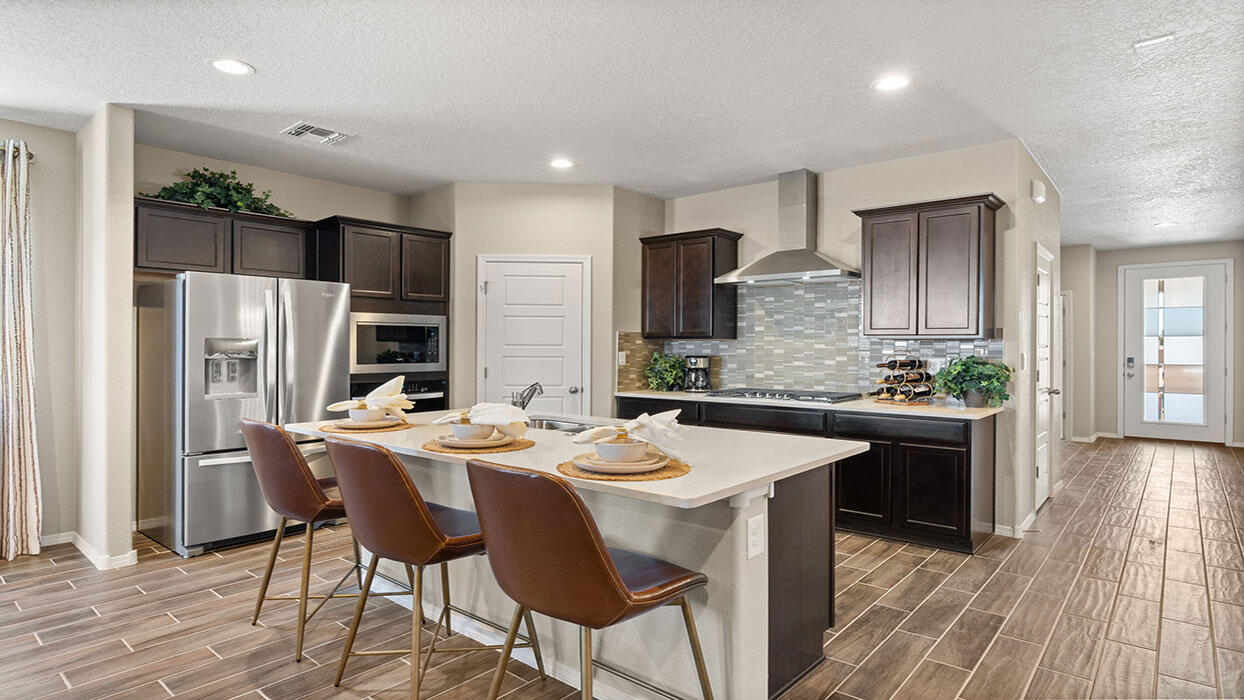 Welcome to Stone Mountain by D.R. Horton! The Inspiration is a brand-new floorplan with all the premium options you could ever want. It features a built-in kitchen cooktop and built-in wall oven, 8-foot doors, a garden tub, and a separate shower in your luxurious primary suite. This home also comes with a three-car tandem garage and so much more. You'll have to see it to believe it! Don't miss out on special financing rates and additional incentives from our in-house lender. Contact me for details!  Come on down and let's make this dream home a reality!