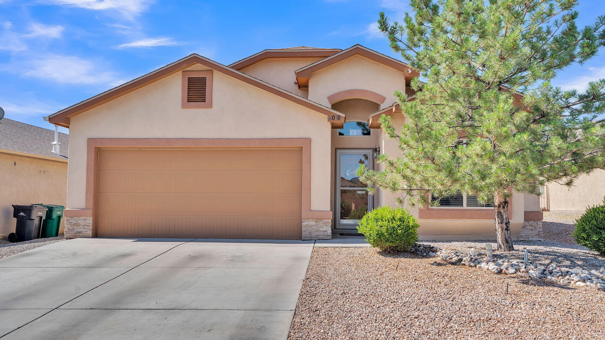 Welcome to this beautifully updated 4-bedroom, 2-bathroom home with a 2-car garage, offering both comfort and style. Inside you will find two spacious living areas, perfect for relaxing or entertaining. The home features tile and laminate flooring throughout--no carpet anywhere.  The kitchen was fully remodeled in 2024 and is a true highlight, with butcher block countertops, a great island, farmhouse apron-front sink, under-cabinet lighting, and modern appliances--all new in 2022. The open layout and updated finishes make it a space you'll love spending time in.  Other recent updates include a new roof, fresh stucco, and appliances--all completed in 2022. The water heater was replaced in 2020, offering peace of mind for years to come. The home also features new lighting throughout.