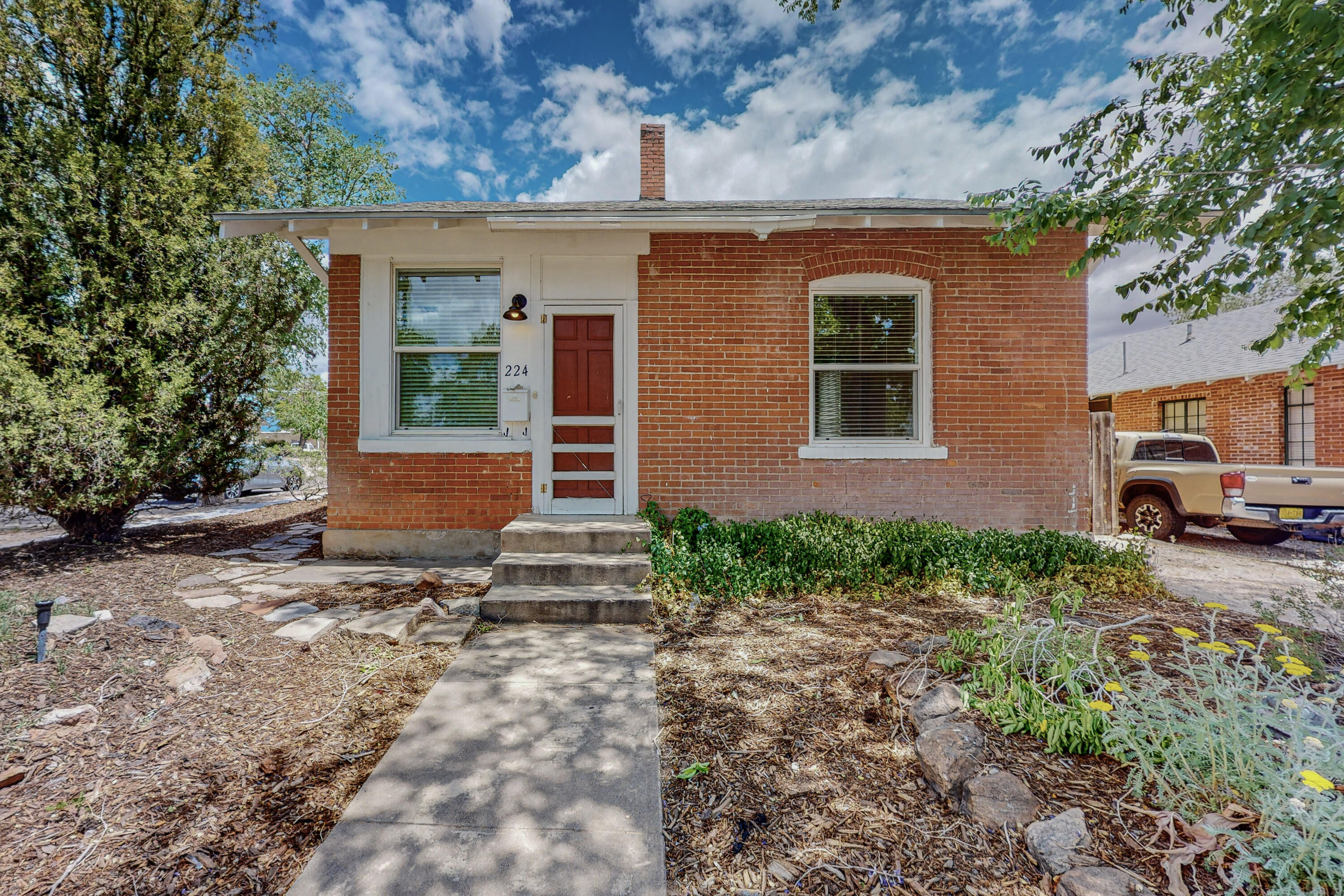Charming and cozy bungalow in the heart of Albuquerque's University and Medical district. Currently operated as a fully-furnished and appointed mid-term rental, located a short distance from the UNM campus and three major medical centers. 2 BR, 1 BA w/ office space. Laundry room w stackable washer/dryer.  Upgrades and updates in 2023 include: complete interior repainting, new electrical panel , laminate flooring, new roof w/ 3 years left on warranty, new sewer line and main line under house , new refrigerated air/ heating mini-split system and wireless security-system. Large covered patio and fully fenced backyard.