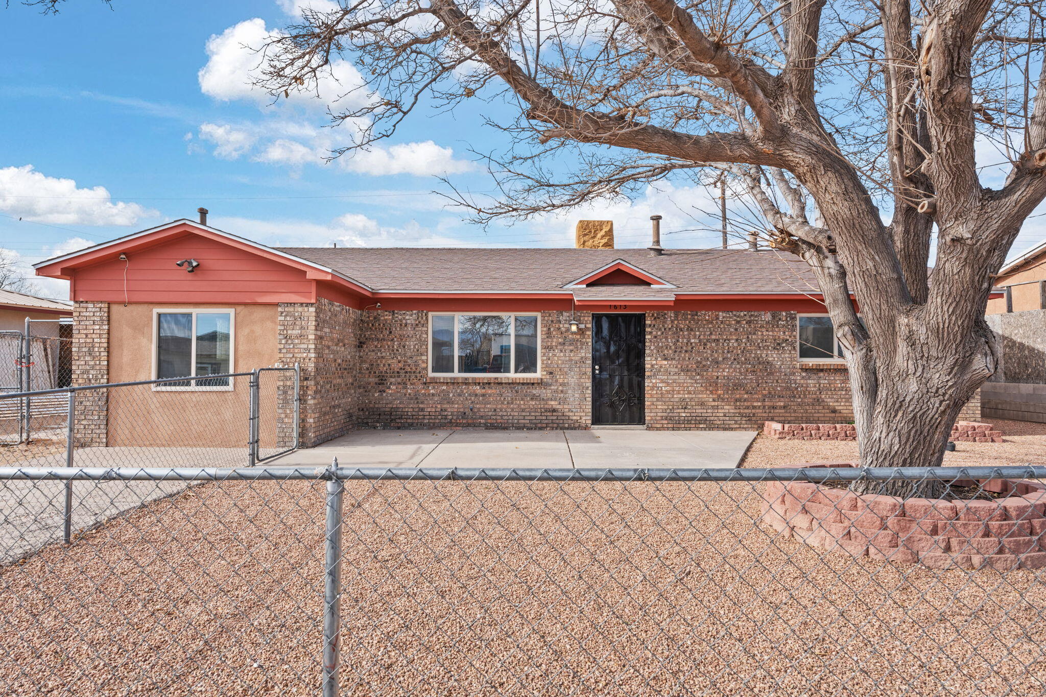 Welcome home! This 4 bedroom, 2 bathroom house has been remodeled with new carpet, paint, ceiling fans, bathroom countertops and kitchen appliances and is ready for it's new family. There is backyard access and a large shed for your toys. The front yard has been xeriscaped for easy maintenance. The property backs up to open space with no neighbors behind you. The roof was replaced in 2021, the hot water heater in 2022. Come see this one!