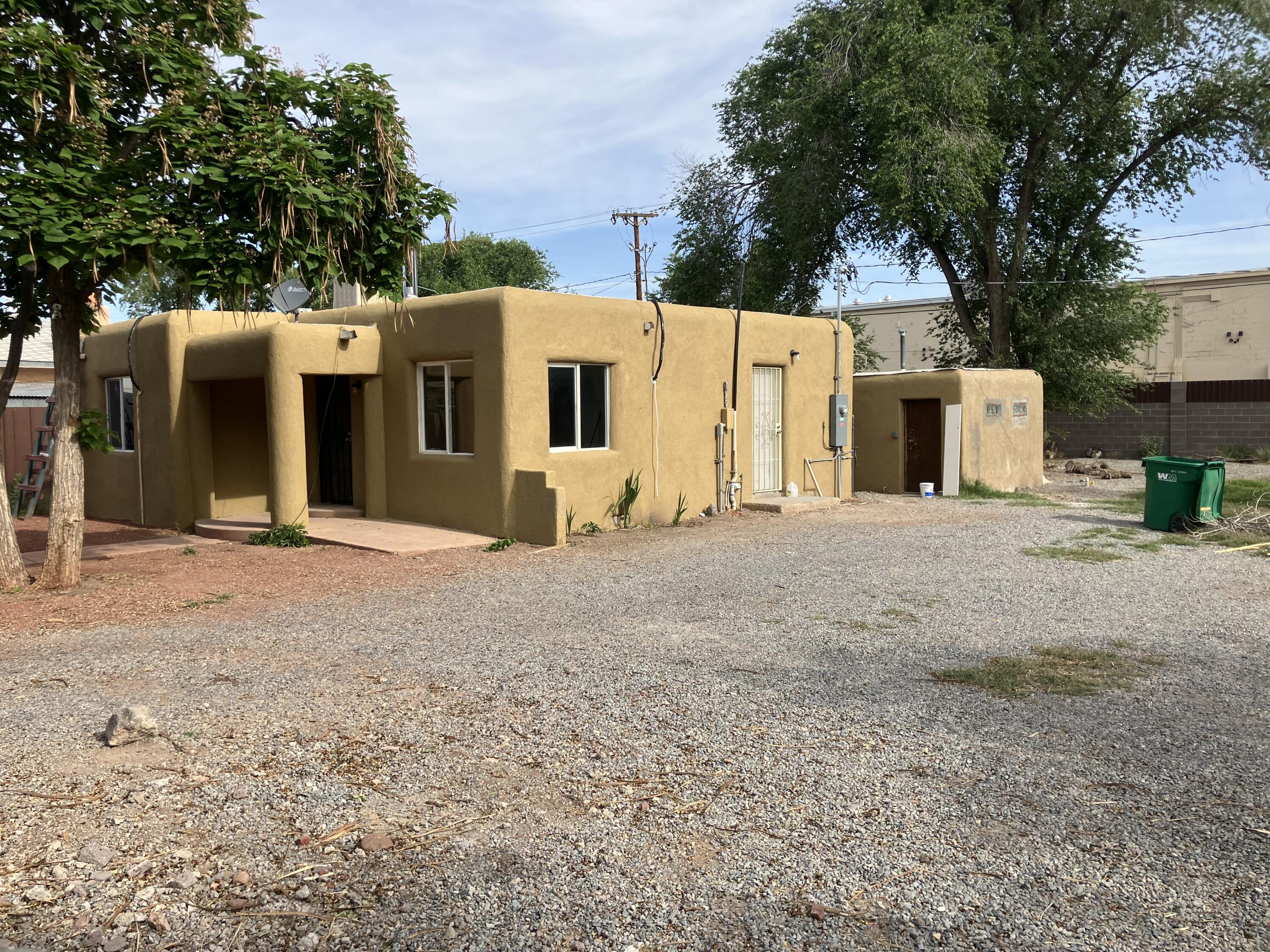 900 Sq foot home with an additional Lot East of home, endless possibility for another home or great space for a RV.  The entire property is gated with either Block wall or panel fencing.  This 2-bedroom 1 bath home is tiled throughout.  Updated electrical panel.  Great starter home on a huge lot.  Brand new synthetic stucco compliments this property.