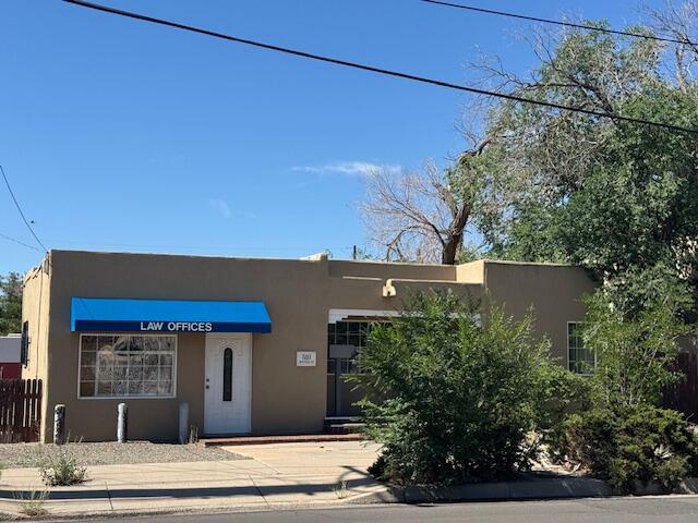 Residential currently used as a law office.  Leased currently. Nice Hardwood floors.  Huge back yard that backs up to alley.  Do not approach property. Need to make appt with agent.