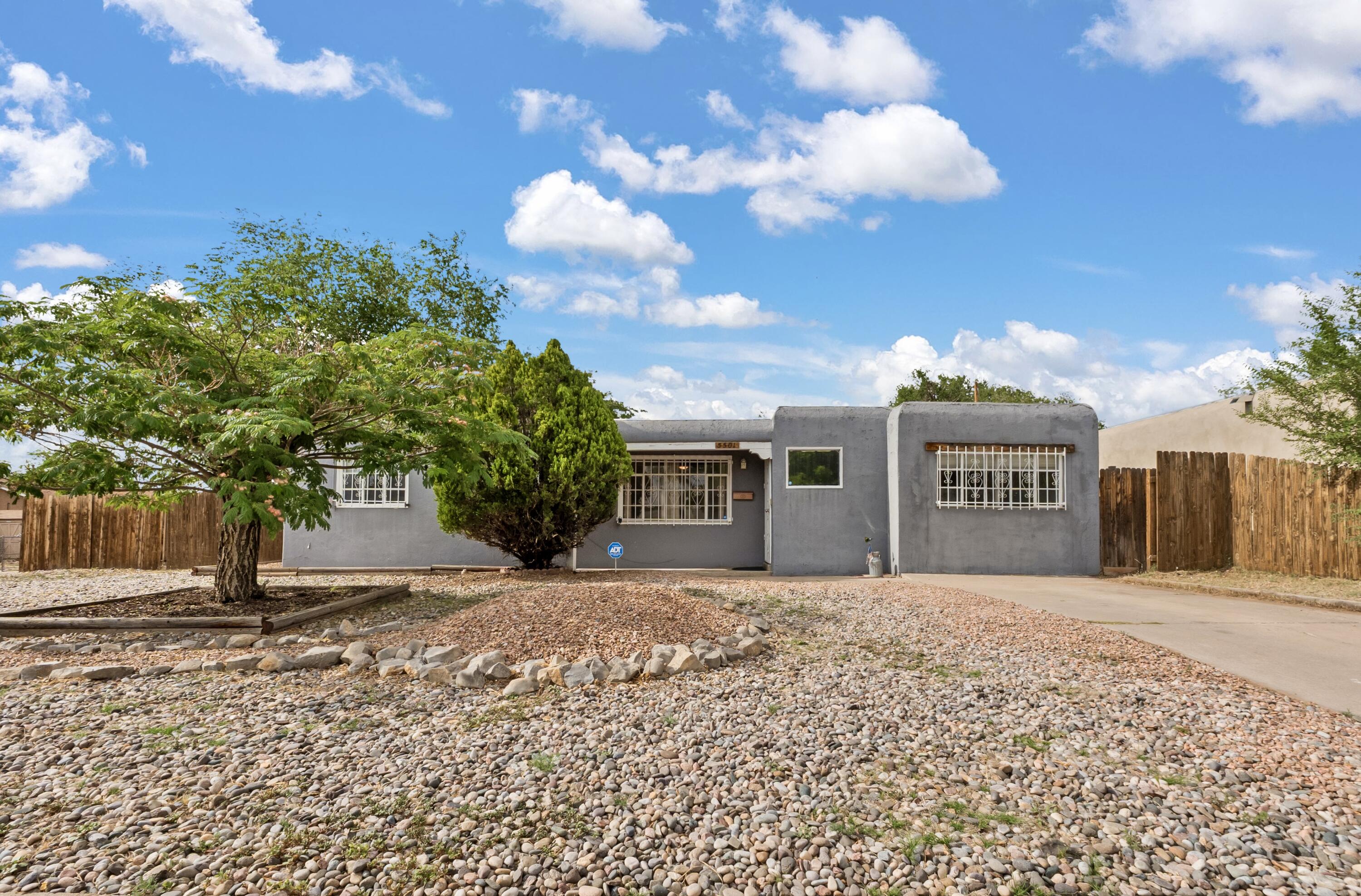 Welcome to 5501 Arvilla Avenue NE--a sun-filled corner lot gem in the heart of the Northeast Heights! This move-in ready home offers 3 bedrooms, 1,325 sq ft, and a smart, functional layout with updated laminate and tile flooring, fresh paint, and abundant natural light. The eat-in kitchen features solid maple cabinets, vintage charm, and great storage. Enjoy an oversized backyard with backyard access, turf, pavers, and a shed--perfect for entertaining or gardening. Updates include a TPO roof (2020), refreshed fixtures, and new flooring. A great opportunity for first-time buyers or investors alike!
