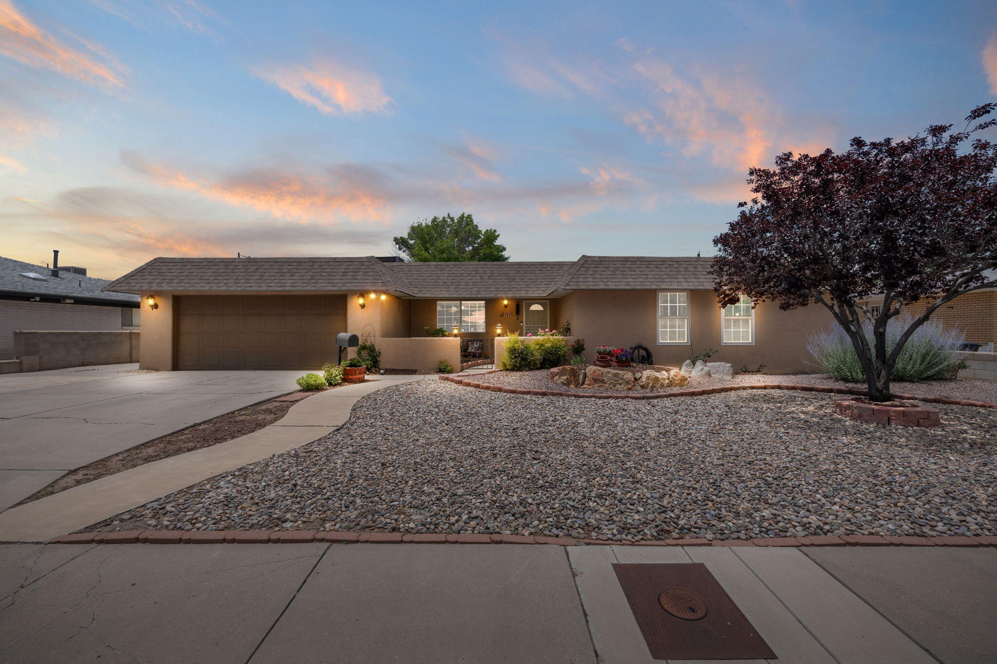 Beautifully updated single story home located on a .26 acre property! Home features 2,391sf with 4 bedrooms, 2 bathrooms, 2 living areas, an office and 2 car garage. Front living area with refreshed paint and tile floors. Wonderful kitchen space with ample cabinet space, a china display, stainless steel range, microwave and a breakfast bar with seating space. Work from home in your private office. Great 2nd living space with fireplace. Spacious owners suite with upgraded flooring and bathroom. Bath hosts dual sinks and a walk-in shower. Stunning fully landscaped backyard with a covered patio and a a pool! Close to shopping, restaurants and more!