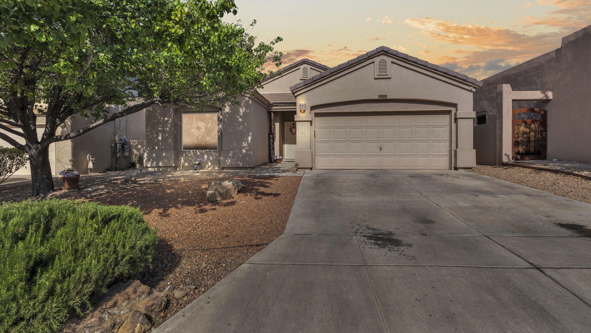This stunning 3-bedroom, 2-bath residence in the sought-after Oxbow subdivision is waiting for you! Enjoy a bright and airy open floor plan that flows seamlessly from room to room. Three generously sized bedrooms provide ample space for your family or guests. Two full bathrooms, featuring modern fixtures and finishes for your comfort. Cook up a storm with stainless steel appliances, including a smart stove that adds convenience to your culinary adventures. A lovely yard perfect for outdoor activities or relaxation, ideal for entertaining friends and family. Xeriscaping complimented by an irrigation system that provides water to plants in the front and back yard as needed, ensuring efficient water use. This home is not just a place to live, it's a lifestyle. Make this home yours!