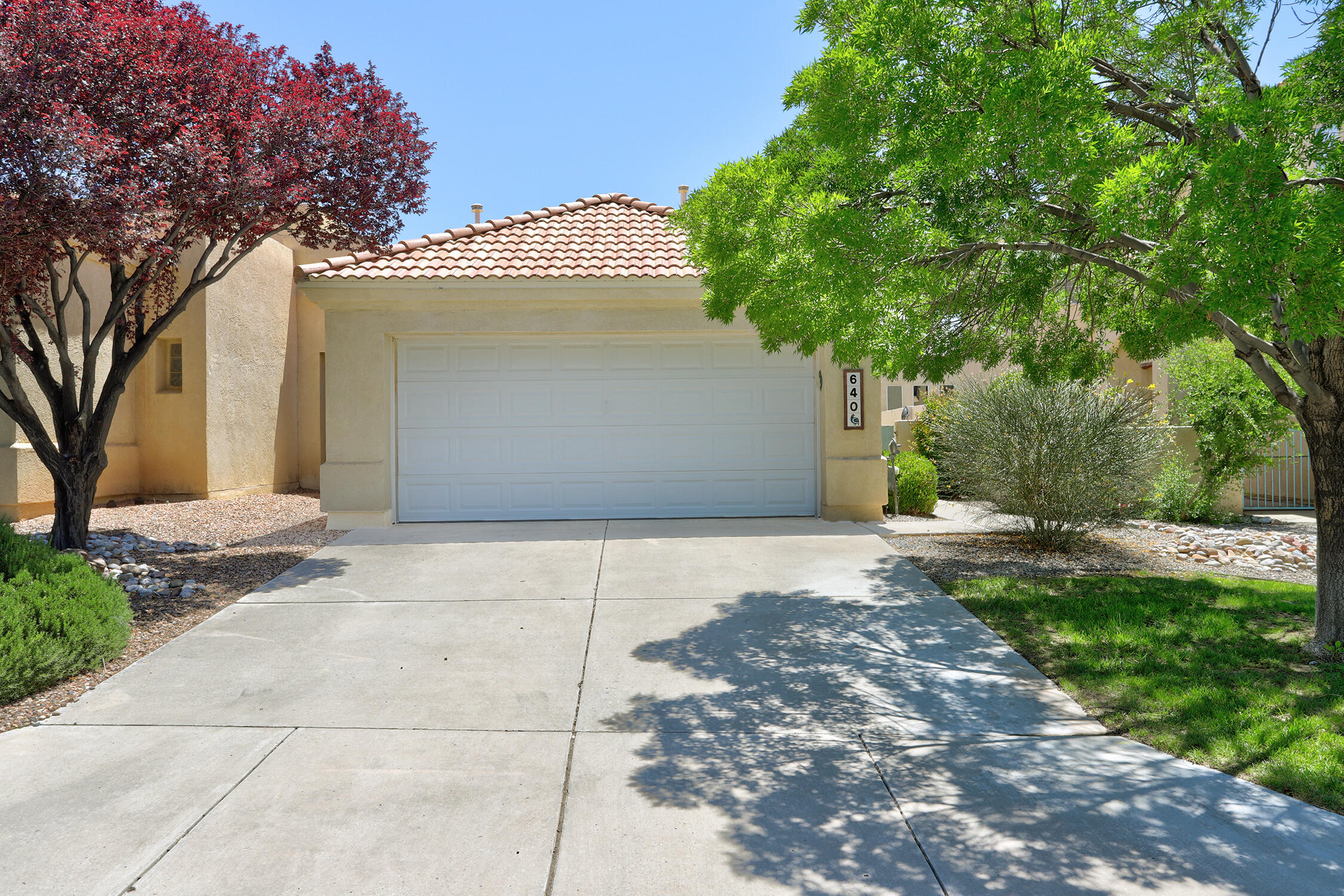 Sweet 2bd casa located in Renaissance TH community now available!  Seller invested much time & money updating the home: granite counters in kitchen & baths, updated appliances & engineered wood flooring to name a few.  Separated bedrooms; one in front, and primary in the rear.  Light and bright space with dedicated dining area.  HOA maintains the front yards in the 136 unit community.   Dues are $93/mo, paid quarterly.  Clubhouse for use by the residents for gatherings & meetings.  Located in central Rio Rancho near shopping, Rust hospital, libraries and Intel. Private yard is low maintenance and has custom built patio cover.  Come enjoy easy living in this charming home.  Let someone else care for your front yard while you relax and enjoy the backyard!  Make an appt  to see today!