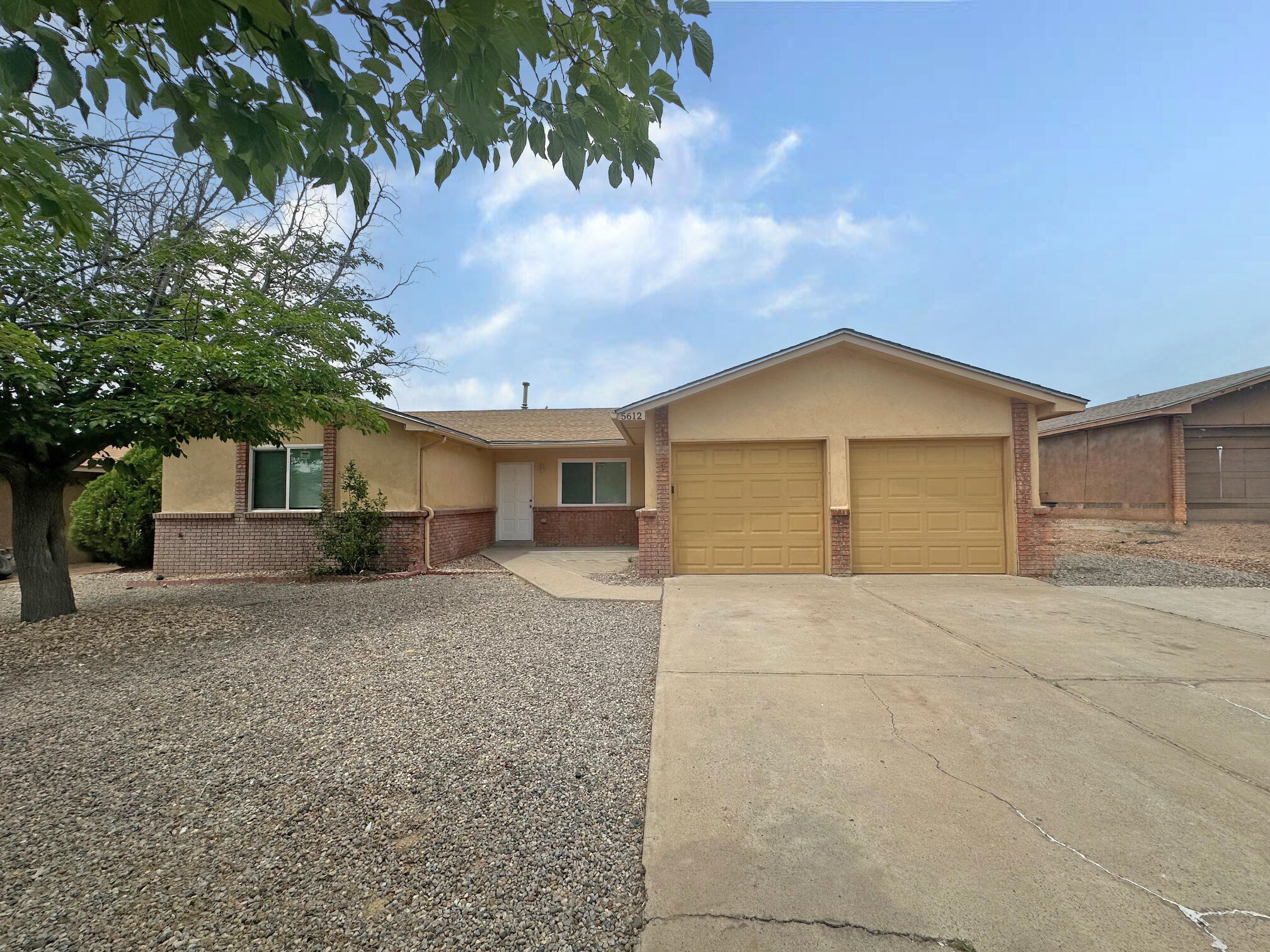 Fresh paint and new carpet add to the appeal of this inviting single-level home. Two living areas allow room for relaxing and entertaining. The main living space has a fireplace and is open to the kitchen and dining area. Large backyard ready for you to make it into your own private summer sanctuary. Two car garage with room for storage or a workshop. Located close to all the amenities along Coors, such as shopping and dining.