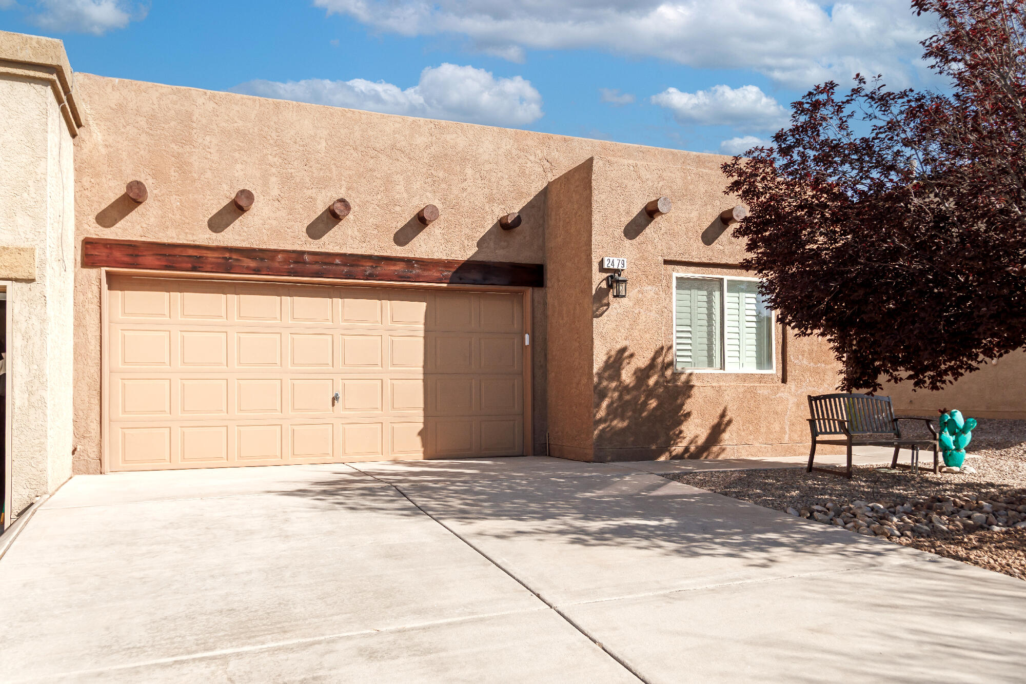 This adorable townhome in the highly desirable GATED COMMUNITY of Astante in Cabezon has been nicely updated over the years & is ready for the next owner. Easy care wood laminate flooring was added to the living area & kitchen. The floorplan is open and bright with a combined kitchen/living room space for entertaining.  Plantation shutters add a nice touch to the front bedroom & living room. The primary bathroom is nicely appointed with a walk in tiled shower area & upgraded bath vanity.  All appliances remain with the home. Fresh neutral paint recently completed in many rooms. Heater/refrigerated AC was replaced in 2022 & a new garage door opener this June. 2 car garage. This home can't be beat!!