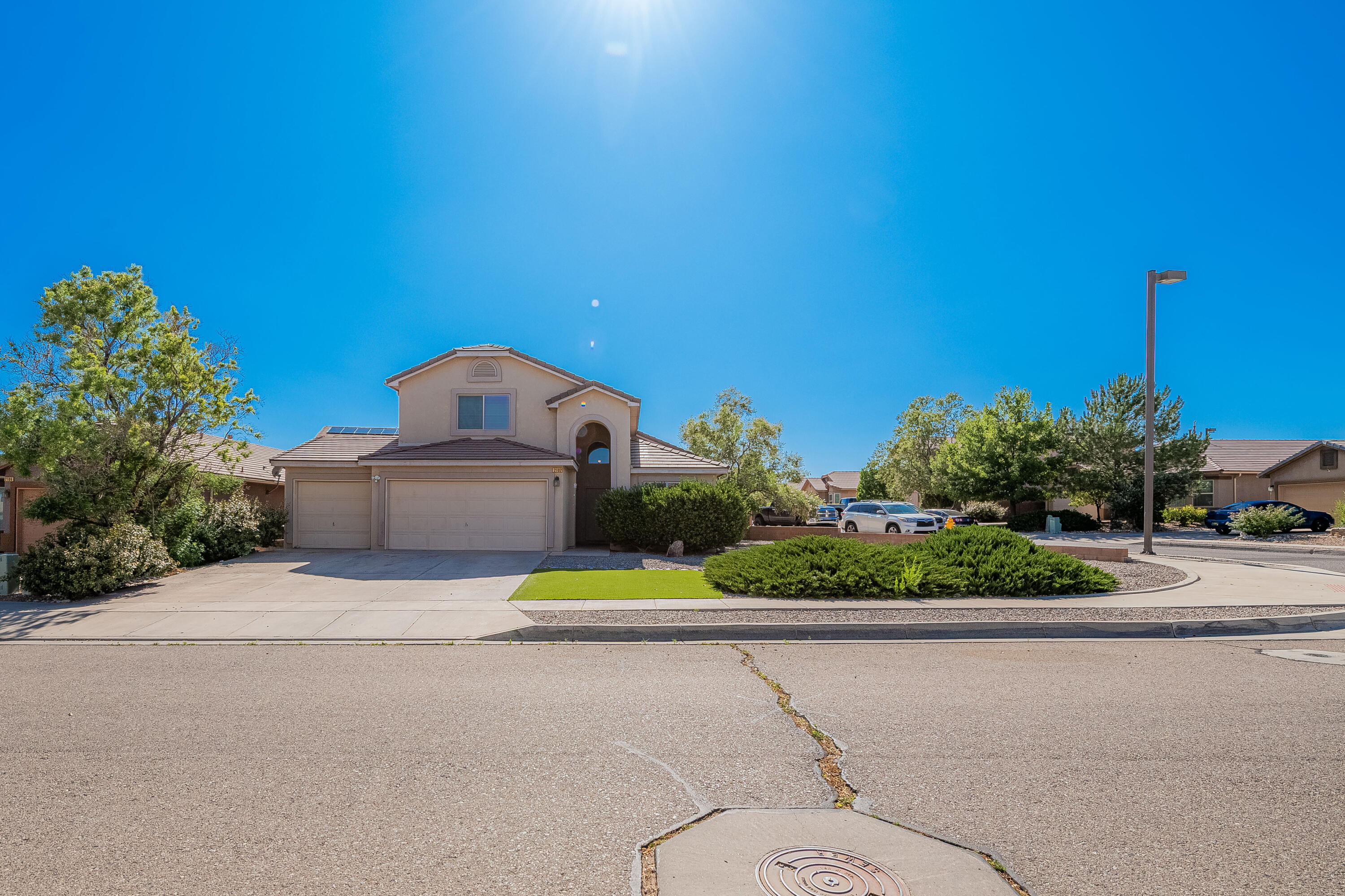 Exceptional move-in ready & like new, DR Horton home in Cabezon this customized 3 bedroom home sits on a premium oversized corner lot with professional landscaping and featuring covered patio with a Jacuzzi hot tub--perfect for outdoor relaxation. The open-concept floor plan features tile flooring wet areas, and premium laminate planks throughout for a modern, spacious feel. kitchen features upgraded appliances, quartz countertops,  and plenty of cabinetry offers excellent storage throughout. The primary suite is thoughtfully separated from the secondary bedrooms as it is conveniently located in the main floor, abundant storage with a three car garage.