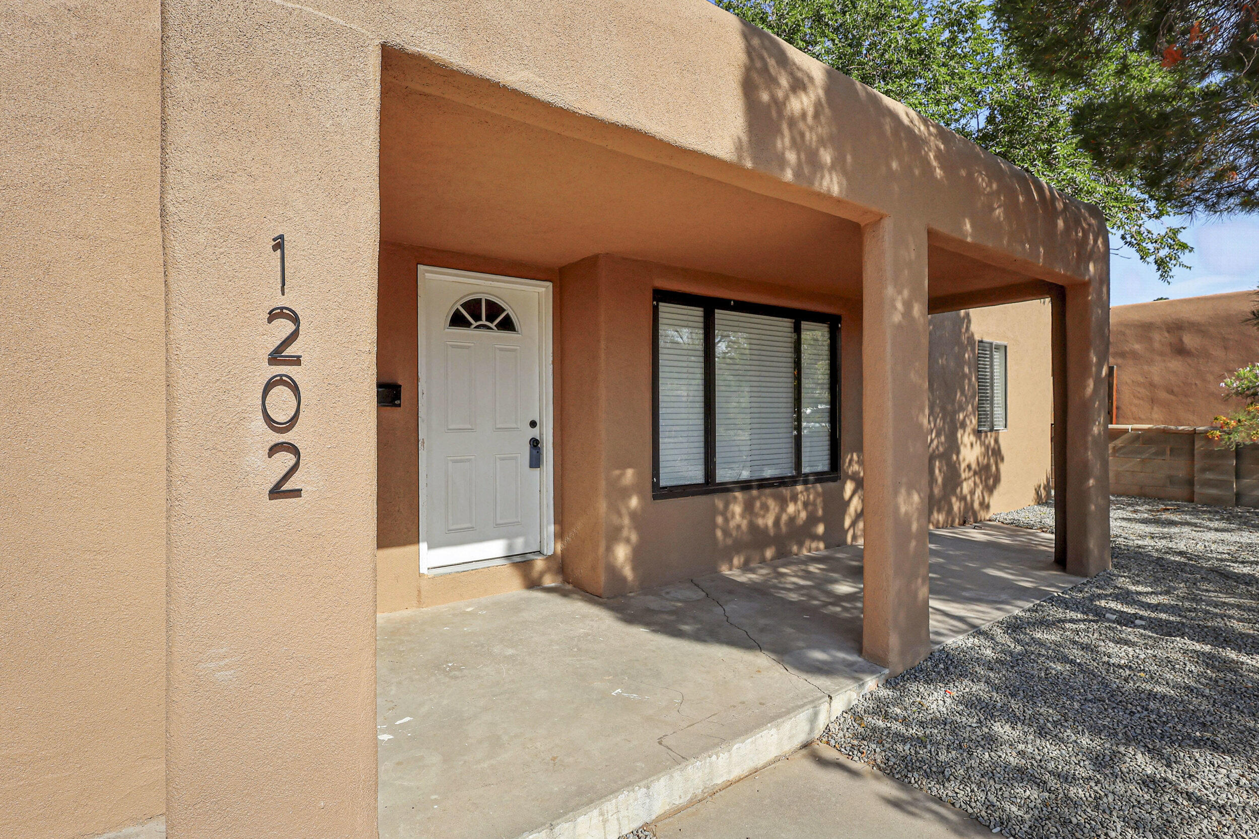 Welcome Home!! This nicely updated single-story is a charmer! Updated kitchen with new cabinets, countertops and stainless steel appliances!! Refrigerated air! Refinished original wood floors and fresh paint throughout! Updated bathrooms! Also a separate area that can be used as an income producing unit!! It is a must see!!