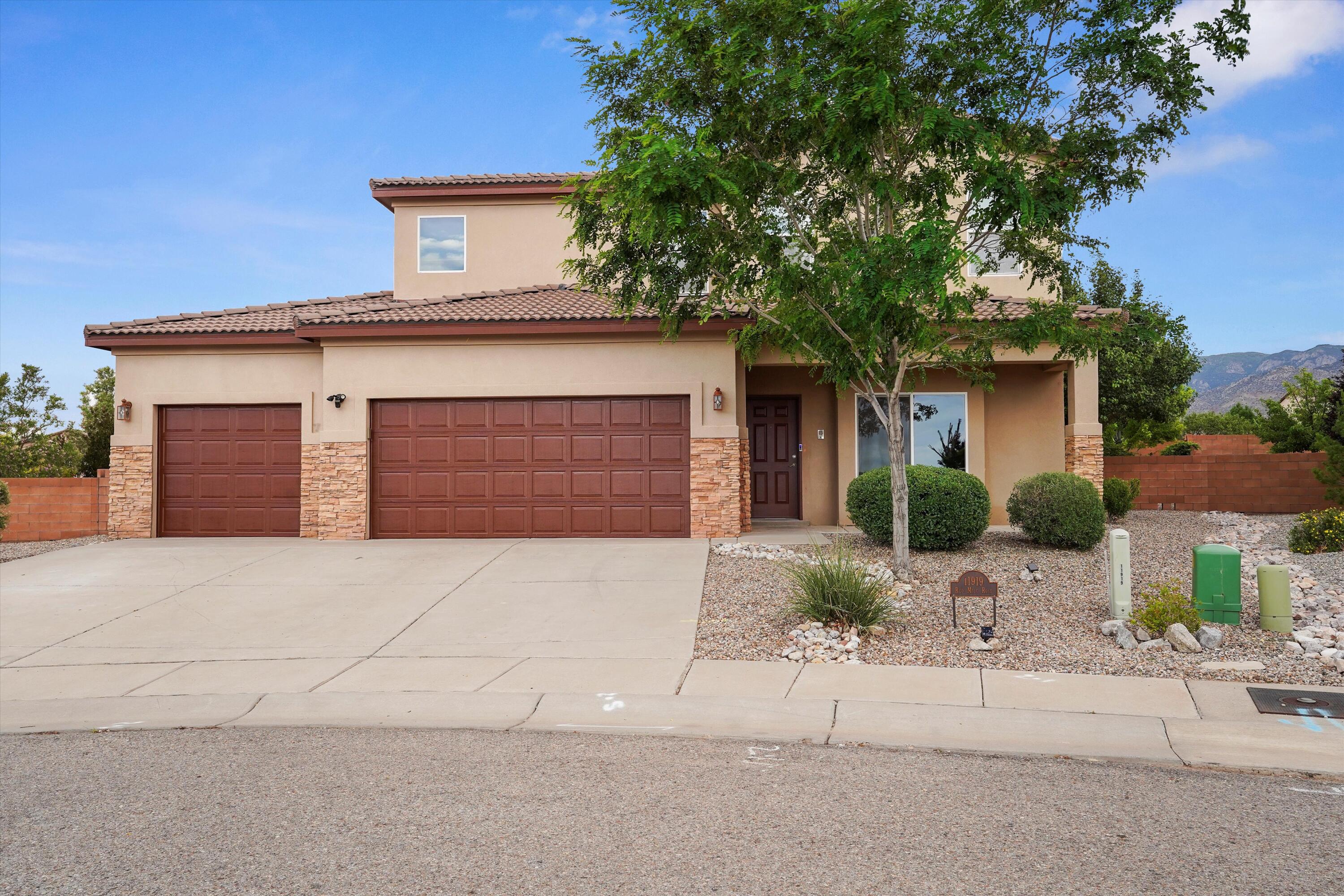 5 BR, 3-1/4 bath in desirable southeast Albuquerque Volterra community. Features a well-appointed kitchen with gas appliances and pantry, two master suites and a fireplace. New paint throughout and new carpet. Downstairs has laminate wood floor in common areas. Entry, kitchen and 1/4 bath are tiled.  Walk-in closets in MBs. Double vanities in each full bath. Primary suite features a jetted tub with separate shower. Utility room has electric and gas. Backyard mountain view - swimming pool, hot tub, pergola, covered patio, deck, outdoor kitchen, TV cabinet, and access to open space trails. Flower garden and vegetable garden are a relaxing get away from the daily routine. Quick access to I-40 for easy travel across Albuquerque. Sandia Labs and Kirtland AFB Eubank gate conveniently close