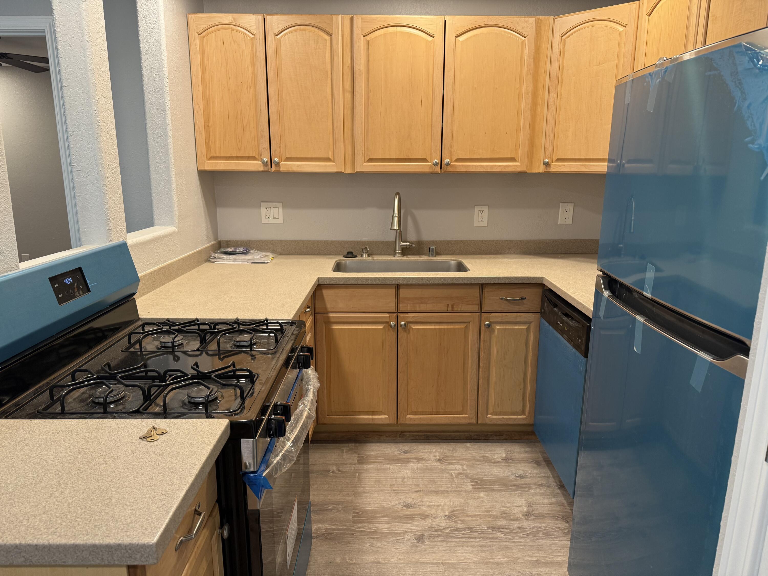 Welcome Home!    Updated ground floor 1 bedroom 1 bath condo in Eagle Crest.  New paint,LVP flooring and stove/refrigerator/dishwasher     Stackable washer and dryer is in the utility closet!    1 year old HVAC!   The HOA includes all utilities, the gate and a security team that drives through the complex periodically    Close to the VA hospital, airport and Puerto del Sol golf course!