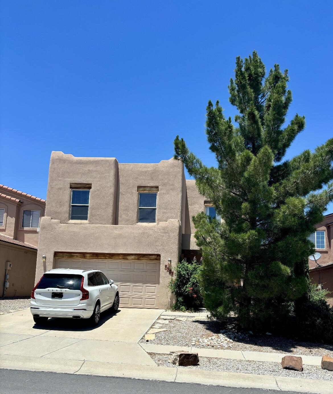 Enjoy this charming pueblo style two story home. Open living, Kiva fireplace, breakfast nook with formal dining room or den, Enjoy fireplace with garden tub in primary bathroom.  The fenced backyard is perfect for hosting gatherings, entertaining, gardening, or just enjoying the outdoors. Close to schools, shopping, I-40 and downtown.