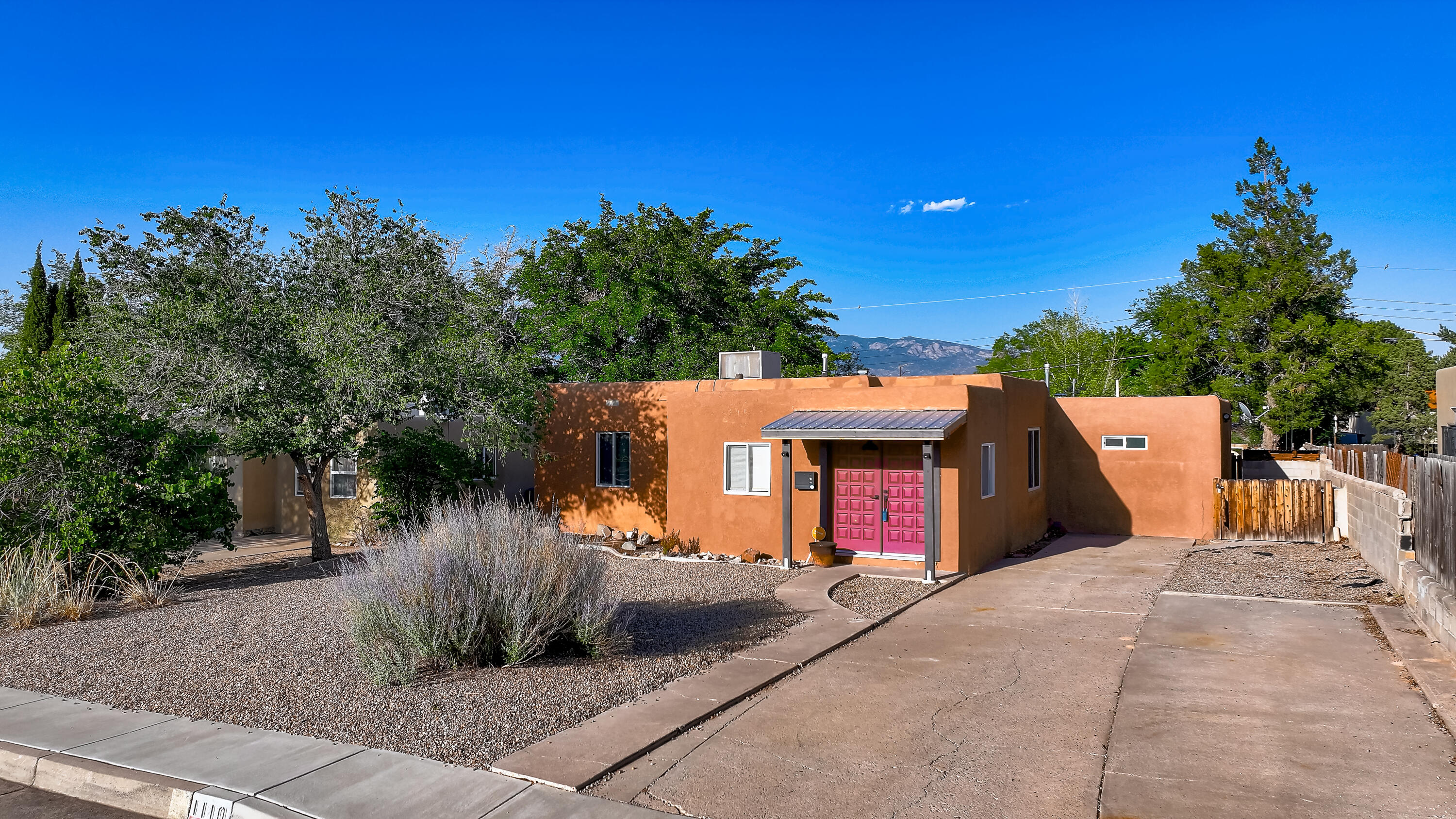 Welcome to this 3-bedroom, 2-bath home in the desirable UNM South area. This inviting property offers a functional floor plan with hardwood flooring. The spacious living room is filled with natural light, enjoy an updated kitchen featuring stainless steel appliances and nice cabinetry. Featuring 3 well sized bedrooms and 2 bathrooms there is plenty of space. The backyard is a true retreat with a covered patio, mature trees, and space to garden or entertain. Conveniently located near UNM, CNM, Nob Hill, downtown, and I-25, this home offers both charm and accessibility. Perfect for first-time buyers, students, or as an investment opportunity. Don't miss your chance to see this classic Albuquerque home--schedule your showing today!