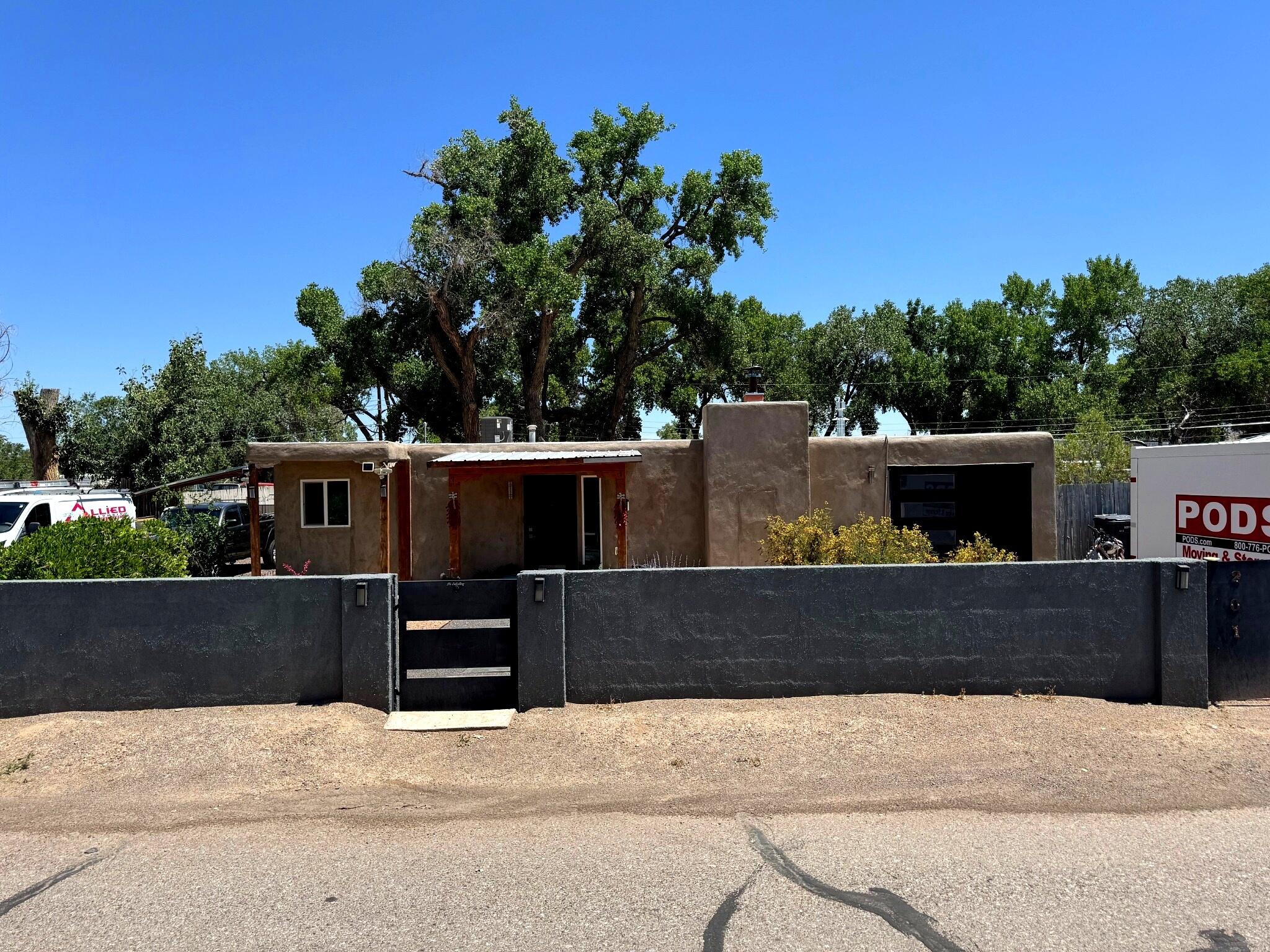Fully Remodeled Gem Along the Rio Grande Bosque - Peace, Privacy & Stunning Views, Step into serenity with this beautifully remodeled 2-bedroom, 2-bathroom home nestled along the lush Rio Grande Bosque. Surrounded by mature cottonwood trees, this private oasis offers both modern upgrades and the timeless charm of New Mexico's natural landscape. Every detail of this home has been thoughtfully updated--from the new TPO roof, energy-efficient windows, and brand-new AC unit, to the polished concrete floors that lend a sleek, contemporary touch throughout. The kitchen and bathrooms have been fully upgraded, featuring stylish finishes and modern fixtures that elevate both comfort and convenience. Enjoy peace of mind with all-new well equipment and a new septic system, ensuring efficient