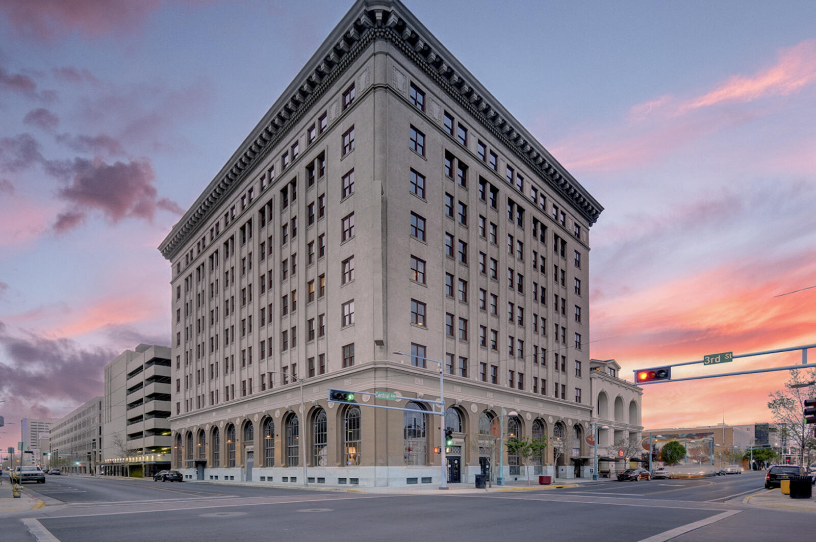 Welcome to The Banque Residences -- an architectural masterpiece originally constructed in 1921 and once home to Albuquerque's First National Bank. This historic building has been thoughtfully reimagined into a blend of luxury condominiums and modern business spaces. Unit 503 spans portions of the 5th and 6th floors, showcasing stunning views of downtown Albuquerque. The lower level features an open-concept kitchen, dining, and living area, + half bath. Upstairs, you'll find two spacious bedrooms, a large full bath, and a laundry closet. Enjoy direct access to covered city parking and take advantage of the rooftop social area with sweeping panoramic views of the city skyline and Sandi Mountains.  Located close to UNM, regional hospitals, fine dining, and 15 minutes to the airport.