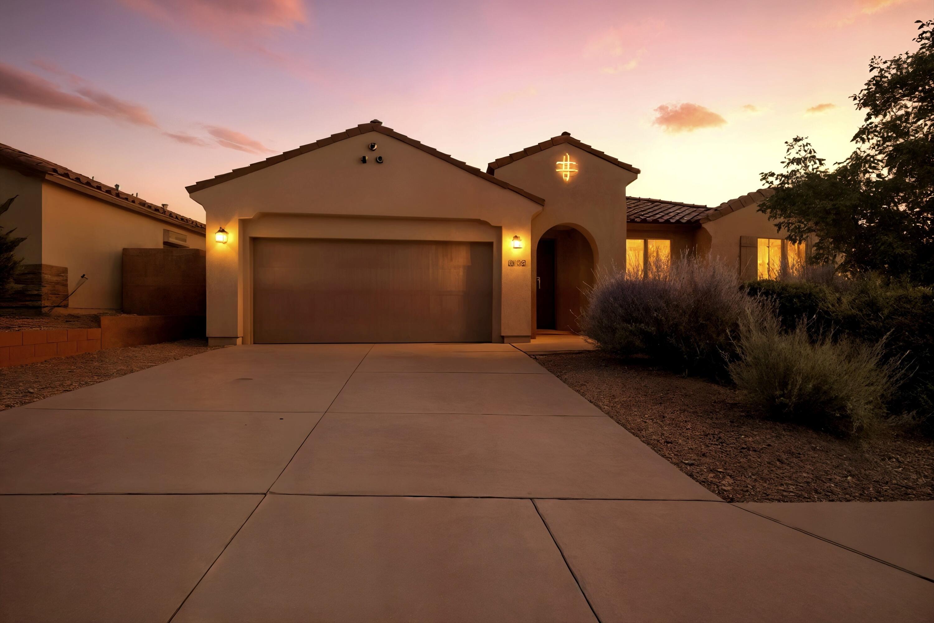 Unlock your dream lifestyle in this breathtaking 2018 gem! Stay cool with refrigerated air under a stylish Spanish tile roof. The gourmet kitchen dazzles with granite counters and top-tier appliances, perfect for culinary adventures. Indulge in endless / tankless hot water, luxurious tile/carpet flooring, soaring ceilings, office work station nook and a serene covered patio for al fresco relaxation. Low-maintenance bliss awaits with a fully xeriscaped yard and vibrant artificial grass backyard, ideal for effortless outdoor enjoyment. This modern masterpiece blends sophistication and comfort--your forever home awaits!