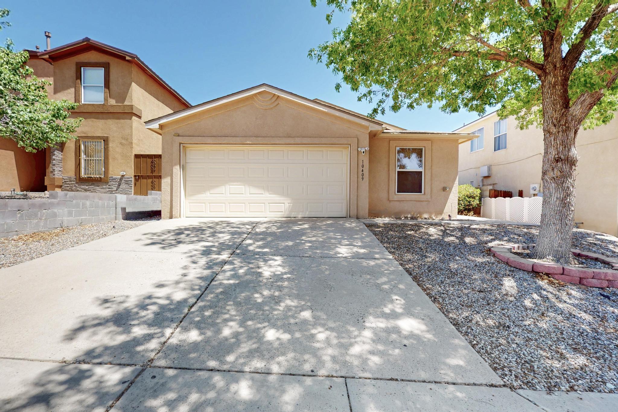 Welcome to 10409 Red Robin Rd SW a well-designed, single-level home offering over 1,700 square feet of living space in a quiet HOA neighborhood. This 3-bedroom, 2-bath home includes a versatile bonus room perfect for a home office, playroom, or guest space. Inside, you'll find an open-concept layout with vaulted ceilings and tile flooring throughout the main living areas. The kitchen features ample cabinet storage, and stainless steel appliances including a gas range. The generously sized primary suite includes a dual-sink vanity, soaking tub, and walk-in closet. Two additional bedrooms are located on the opposite side of the home for added privacy, with a full bathroom nearby.
