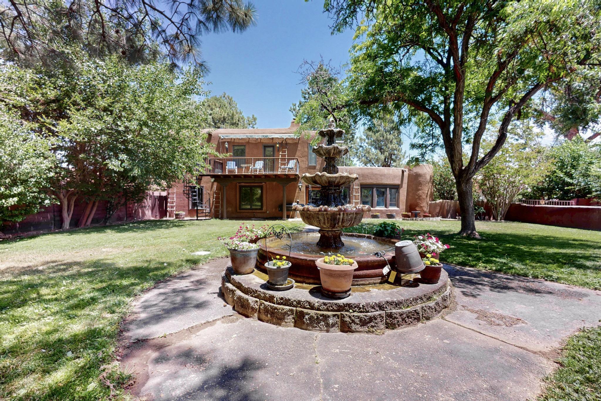 Discover this rare and remarkable estate set in the heart of the beautiful West River Valley--a luxurious blend of Hacienda Adobe style architecture, serene natural surroundings, and top-tier equestrian features, all situated on a sprawling,, meticulously landscaped lot.Arrive in style through a grand, fully automatic gate that opens to a private drive surrounded by lush greenery, mature trees, and a sense of total privacy. From the moment you enter, this estate welcomes you with warmth, elegance, and extraordinary attention to detail.