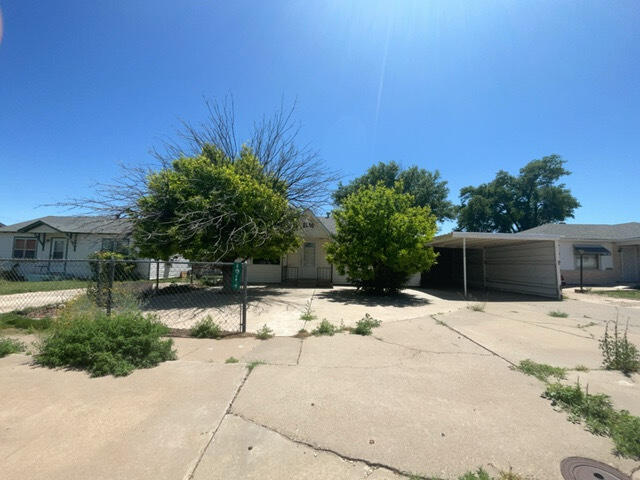 Cute home with so much to offer in Tucumcari! Great features include a sunny living room, nice kitchen with space for a table, three bright bedrooms and two baths. In back, there is a serene area for relaxing, and a handy storage shed. An added bonus is the 1 car detached garage for workshop or storage. Centrally located in an established neighborhood near restaurants, major roadways, and Tucumcari Lake for hiking and birdwatching. Come take a look!