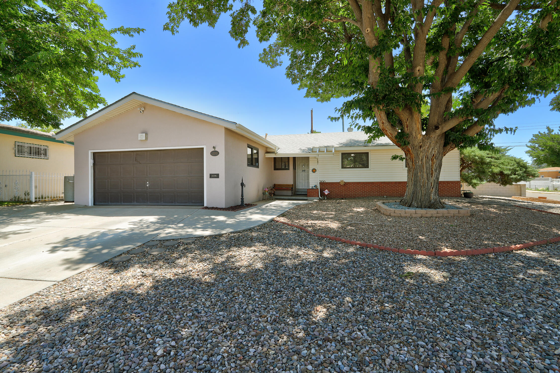 Welcome to this meticulously cared for beauty that has been lovingly updated and cared for over the years! Sitting on a huge 1/4 Acre lot with backyard access, RV/Boat parking & big sheds there is room for all your toys! Enter to find gleaming original hardwood floors, Refrigerated air, fresh paint, updated hall bath w Jacuzzi tub, & the living area features a cozy 2way fireplace to the dining room & large windows that flood the space with natural light. The cooks kitchen opens to the dining area. Step outside onto the expansive patio and take in the beauty of the easy care landscaped backyard & pergola! Located in a quiet and peaceful neighborhood, this home offers the perfect balance of privacy and convenience, with easy access to shopping, dining, and outdoor recreation. Don't miss it!