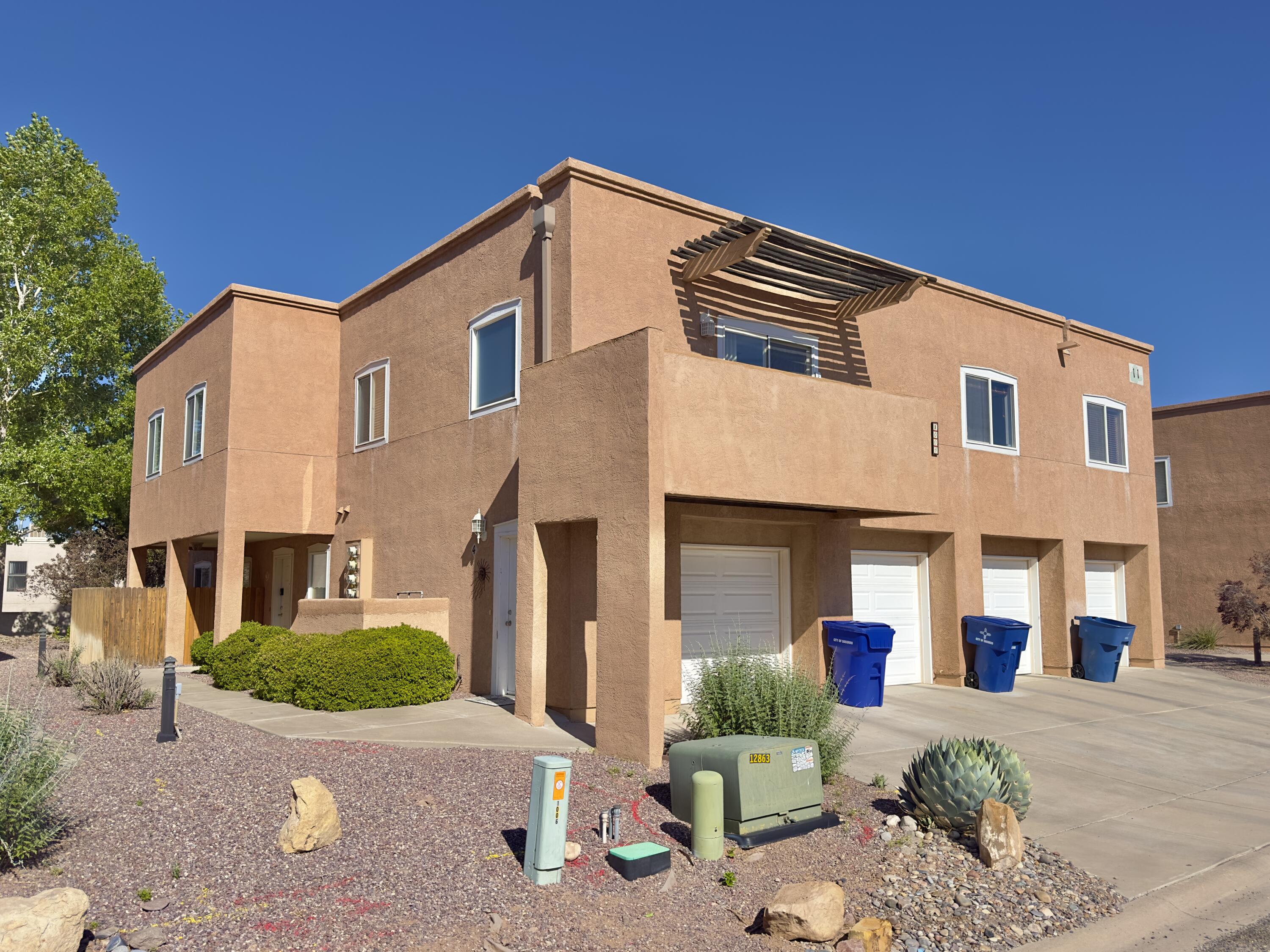 This move-in-ready 2 bed, 2 bath condo offers the perfect blend of comfort and convenience--just a short walk from New Mexico Tech in a premium location! With approximately 1,200 sq ft of open-concept living space, you'll enjoy a bright and airy kitchen and living room, perfect for relaxing or entertaining. Step out onto the balcony and take in lovely views while sipping your morning coffee. The unit features a personal garage, in-unit laundry with a convenient bath combo in the hallway, and quality carpeting throughout. Whether you're a student, or first-time buyer, this home is a smart choice in the heart of Socorro.