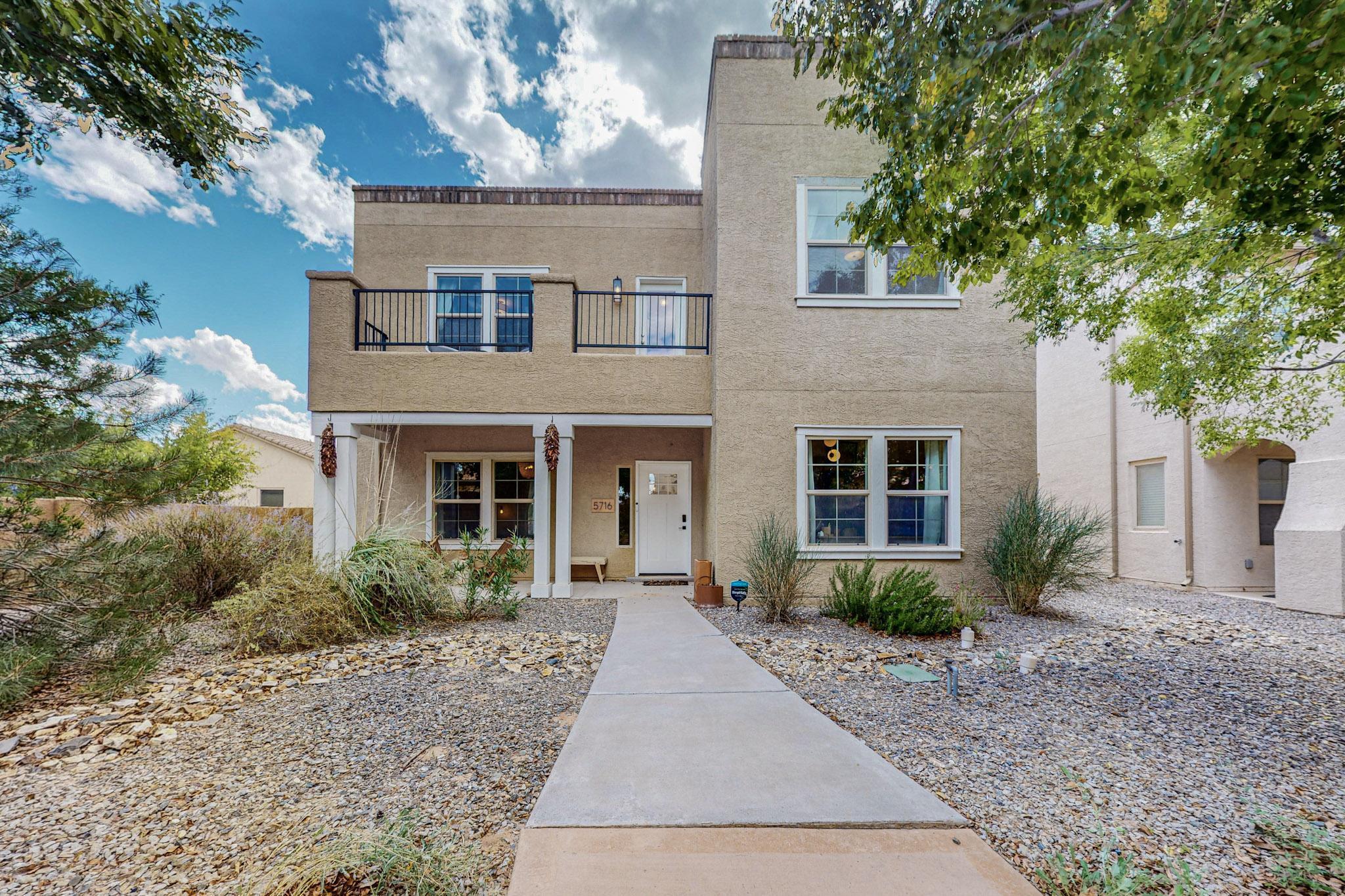 OPEN HOUSE SATURDAY 6/21 11:30-2:00 Nestled in a park like atmosphere and lovingly updated. This cozy home in Mesa Del Sol has a custom tile backsplash & hood in kitchen, pot filler above gas stove, lovely painted cabinets with all new hardware. Reverse osmosis system under sink. All light fixtures replaced throughout the home. All door hardware replaced. Custom landscape in back yard. Custom front door. No carpet. Water resistant Engineered hard wood floor recently installed upstairs and in downstairs bedroom/office and on stairs. Smart home w/smart hub. Large walk in primary closet! w/d & refrigerator convey. 3 car tandem garage. 3rd garage bay was walled in w/door to create lockable storage space but you could easily remove it to re-gain the 3rd parking spac
