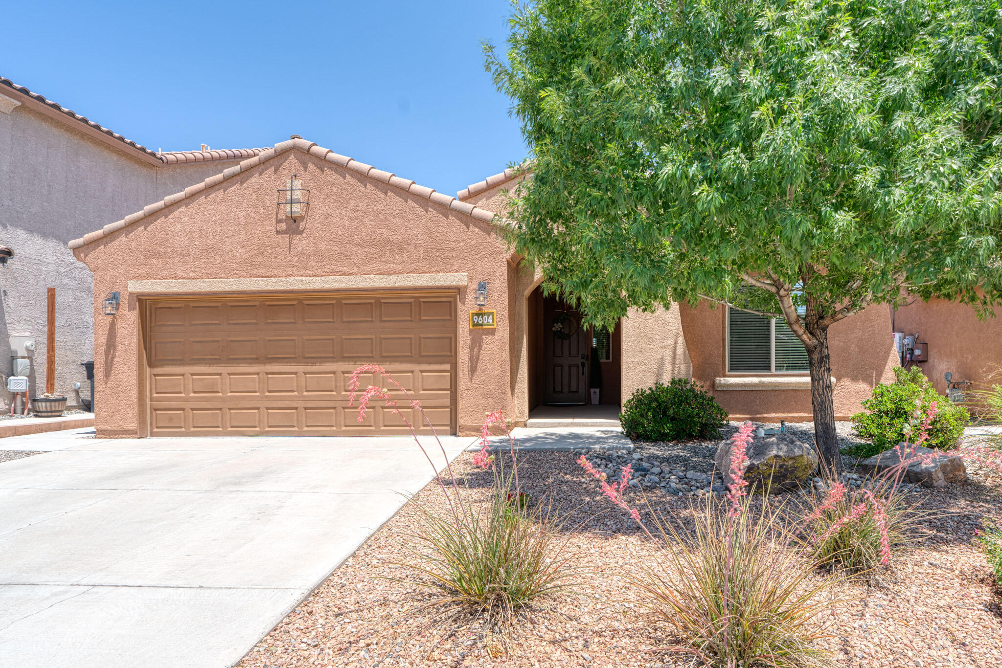 Beautifully maintained Pulte home with open floorplan and elegant upgrades! This property is located in the desirable Boulders subdivision and offers a park just around the corner from the home!  Enjoy granite counters, stainless appliances, new backsplash, and spacious pantry in the stylish kitchen. Relax in the comfortable primary suite with a garden tub, separate shower, double vanity, and large walk-in closet. Features include new laminate floors, Hague water filtration, reverse osmosis and tankless water heater! Step into the garage and enjoy the HEXAGON LED-lit space that offers commercial shop grade urethane coated floors.  Enjoy the cozy fireplace and mountains from the kitchen or living room! Call your favorite Realtor today and come check out this charming, move-in-ready home!