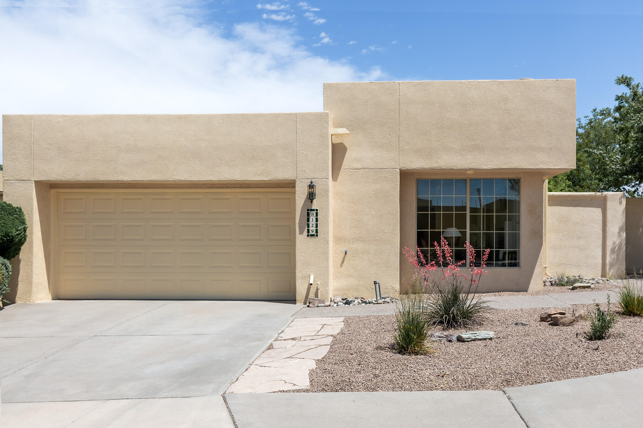 This well-kept patio home in the Countrywood community offers 1,919 sq ft of comfort with twobedrooms, two full baths, plus a study with bookcases and Murphy bed. The chandeliered dining area opens to a spacious living room featuring high ceilings and a gas fireplace.  The hobby room has a wet bar, ample counter space, and lots of cabinet and drawer storage. The kitchen boasts like new cabinets, all appliances, a pantry and a cozy breakfast nook. The masterbedroom accesses the backyard via a sliding glass door and joins a master bath with dual sinks, soaking tub, glass-door shower, and dual closets. A gated side-yard entrance, two-car garage, and mountain views from the backyard complete this thoughtfully designed home within several minutes walking distance to shopping and dining.