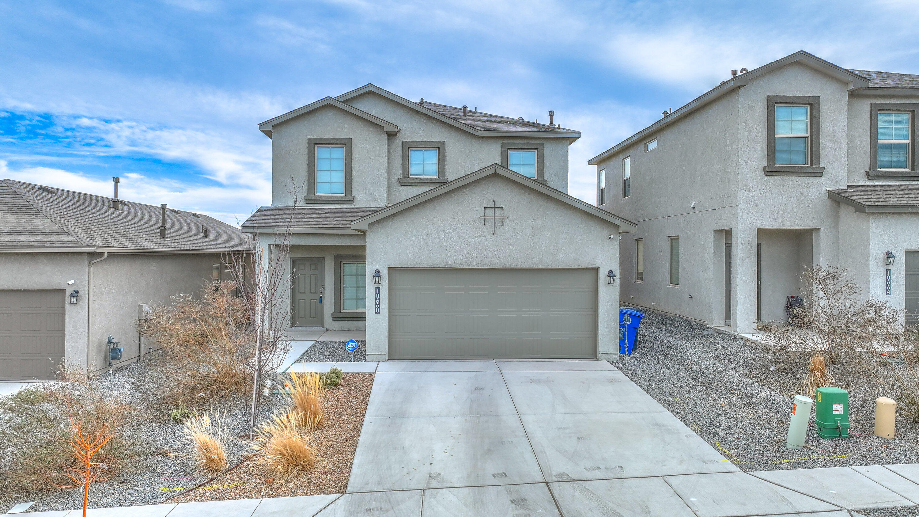 Welcome to this beautifully designed and versatile home and fully landscaped back yard! Step inside to find an open-concept entry that seamlessly connects to the spacious living and dining areas--ideal for both everyday living and entertaining. The stylish, modern kitchen offers the perfect blend of function and flair. A downstairs guest bedroom provides flexible options for visitors, a home office, or multi-generational living. Upstairs, a roomy loft leads to the impressive primary suite, complete with an oversized walk-in closet and built-in shelving for ample storage. Two additional bedrooms offer generous space for your needs. With thoughtful touches throughout and a layout built for comfort, this home truly has it all!