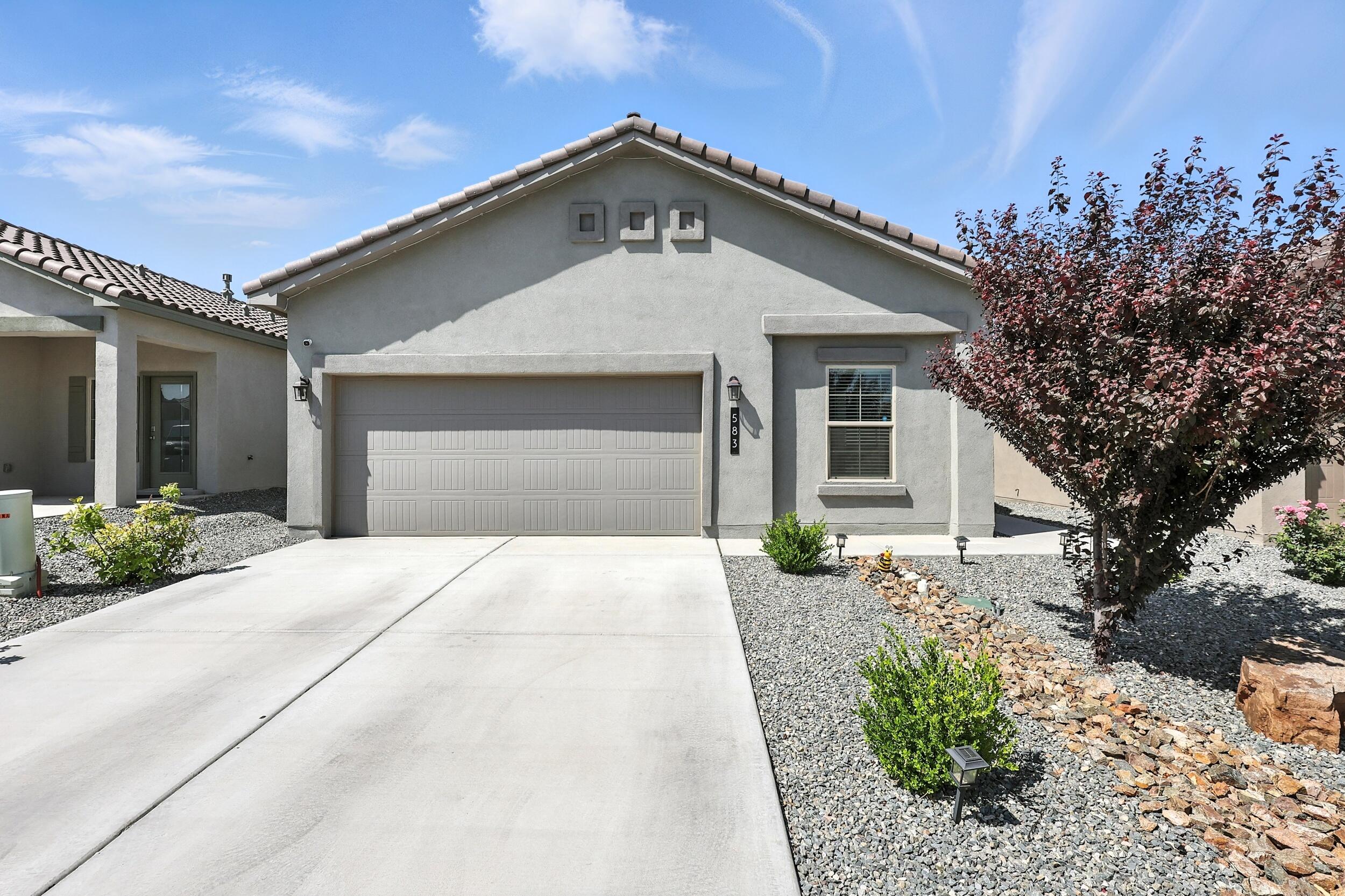 Beautifully upgraded 3 bed, 2 bath DR Horton home in the desirable Los Diamantes community. This open concept layout features a premium package including quartz countertops, crown molding on cabinets, closet build-outs, hardwood doors, Smart Home tech, and tile flooring throughout with carpet in the bedrooms. Enjoy refrigerated air and modern finishes throughout. Amazing location--just minutes from Presbyterian Hospital, Marble Brewery, and the new Market Street grocery store. Priced at $395,000, this is a rare find with high-end upgrades you won't see at this price point!