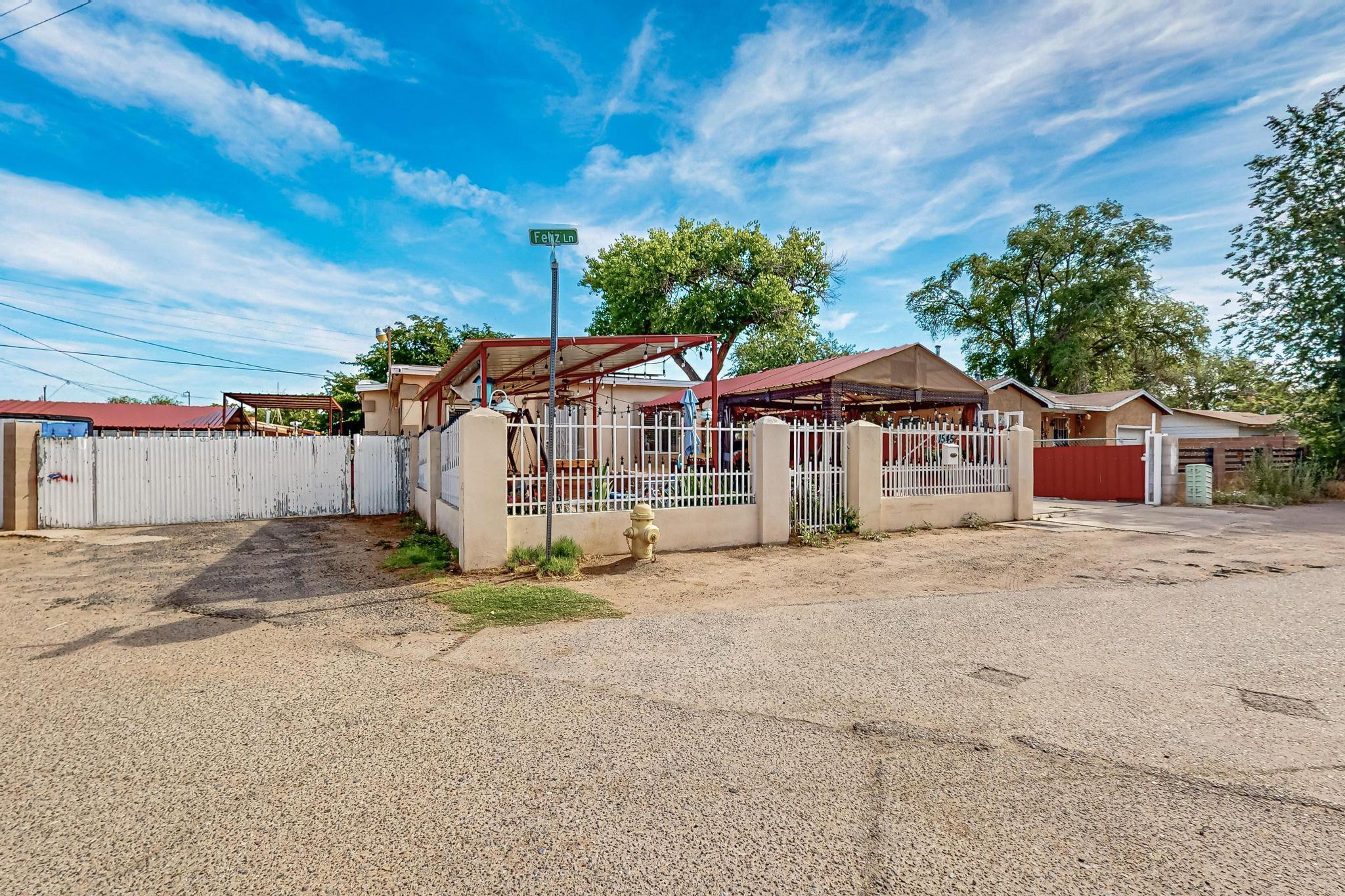 Your next chapter starts here--right in the heart of possibility. Tucked away on a quiet street in one of Albuquerque's most up-and-coming neighborhoods, 1545 Feliz Lane SW offers more than just an affordable place to live--it offers a lifestyle full of comfort, convenience, and potential. This beautifully updated 3-bedroom home features modern finishes throughout, making it truly move-in ready. The primary bedroom and bathroom have been thoughtfully renovated to give you a private retreat that feels both fresh and relaxing. Step outside to find an awesome finished front patio--perfect for entertaining, morning coffee, or summer evenings under the stars.And with side yard access, you've got space for your toys, trailer, or future backyard dreams.