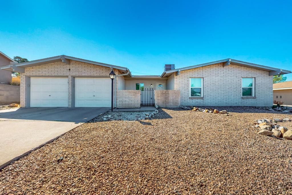 Spacious and recently updated home in Albuquerque's Northeast Heights. This property features over 2,000 sq ft of living space with 3bedrooms and 2 bathrooms. Originally a 4-bedroom, one wall was removed to create a larger primary suite--easily convertible back to a 4-bedroom if desired. Recent renovations give the home a fresh, clean feel throughout. The layout is practical with generous living areas and natural light. The large backyard offers a blank canvas for landscaping, gardening, or outdoor entertaining. Located in a quiet, established neighborhood with easy access to schools, shopping, and parks. A move-in ready home with great potential. We love working with buyer brokers--have your favorite realtor schedule a showing today!
