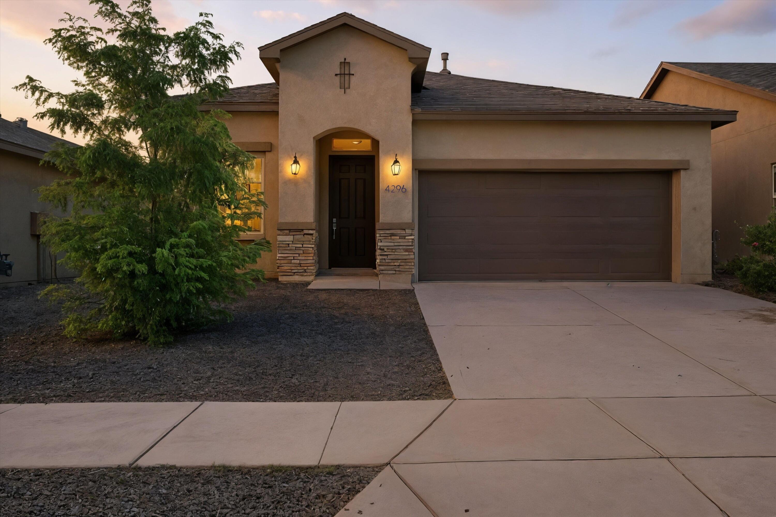 Beautiful 3 bedroom, 2 bath home in Rio Rancho's Mountain Hawk community. Built in 2022 by Hakes Brothers, this 1657 sq ft home features a Tuscan-style exterior, open-concept layout, and modern finishes.  Interior includes carpet and tile flooring and insulated double-pane windows.  Enjoy central forced-air heating, refrigerated air, and energy-efficient design.  The private yard, covered patio, and 2 car garage offer comfort and convenience.  Located on a large lot with full utility connections.  Move-in ready with quality construction in a growing neighborhood.
