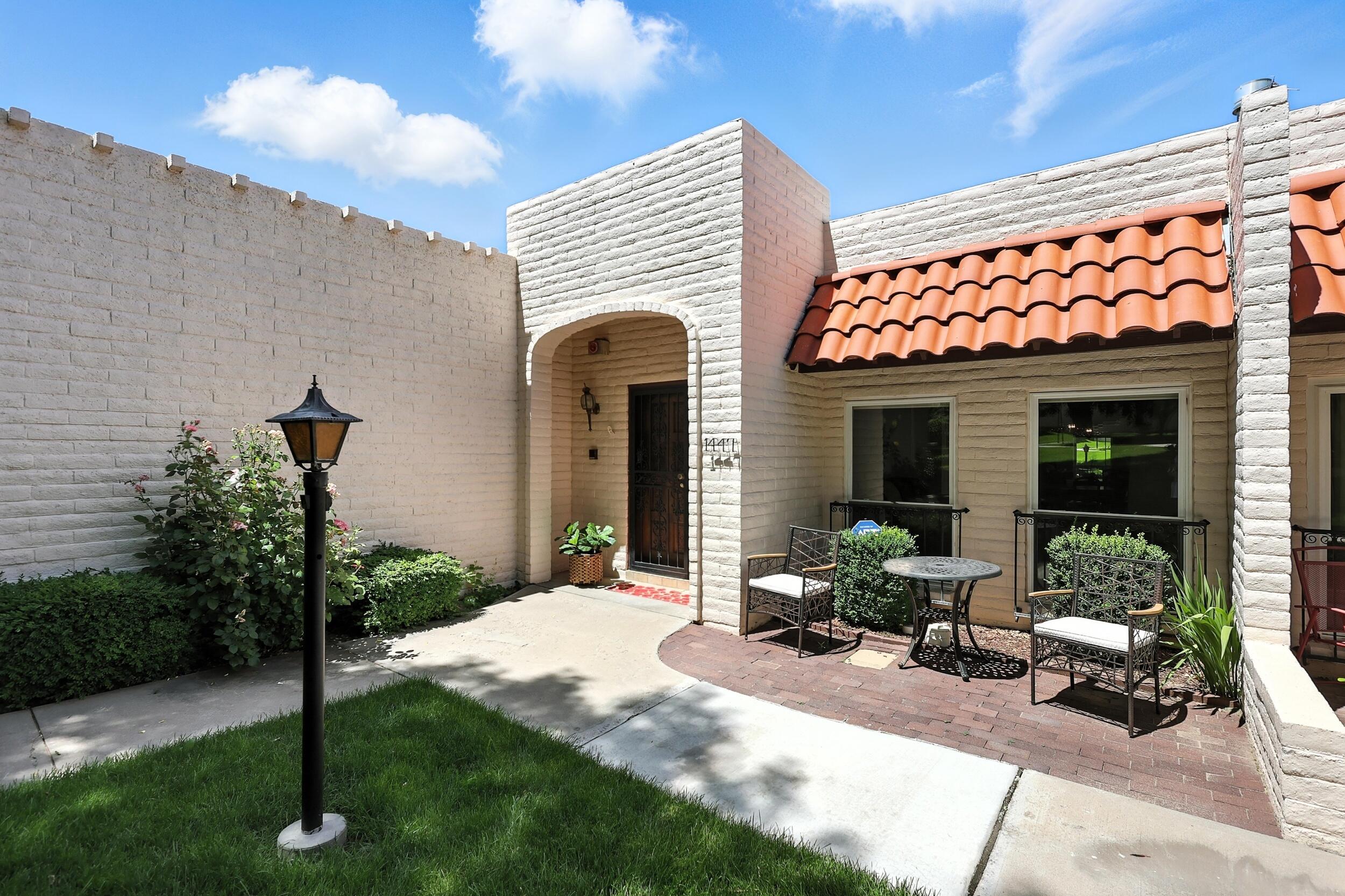 Spacious 2-bedroom, 2-bath condo in the beautiful Villa Serena community, featuring Mid-Century Spanish-style architecture. Enjoy an open floor plan, two living areas, a spacious kitchen, and a private, oversized patio. The large primary suite offers privacy and comfort.Community amenities include a pool, clubhouse, and peaceful, landscaped surroundings. Located in the desirable Four Hills neighborhood.
