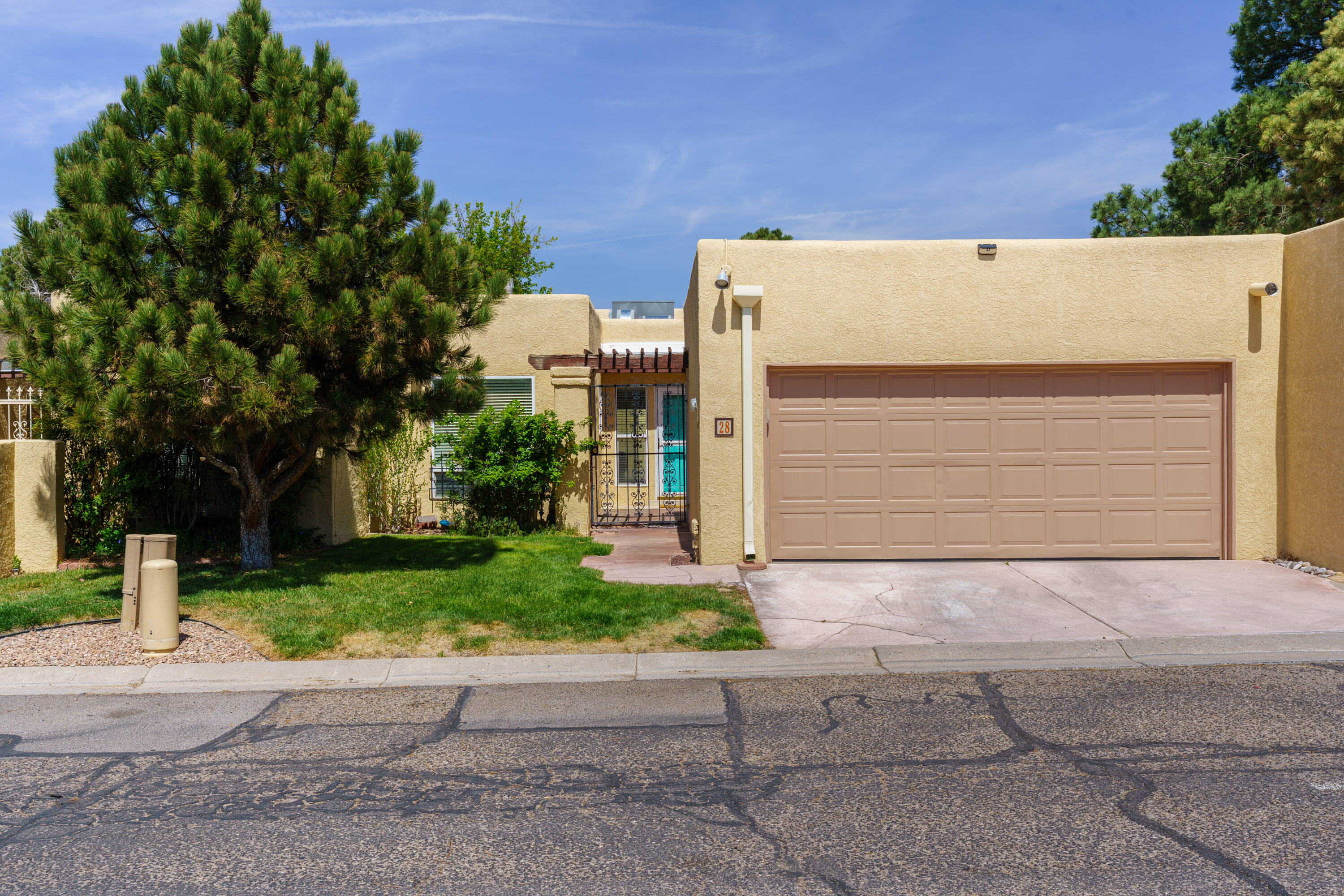 Discover this easy-to-maintain 2-bedroom, 2-bathroom patio home located just minutes from the Arroyo Del Oso Golf Course. Recently updated with fresh paint, a new roof, and a brand-new HVAC system, this home is move-in ready! The open floorplan boasts soaring ceilings in the living room, allowing for plenty of natural light to flood the space. Enjoy both front and rear patios, perfect for relaxing or entertaining. Nestled in a beautifully maintained community, you'll have access to a sparkling pool and the added convenience of HOA-provided services, including front landscaping and some exterior maintenance. Whether you're looking for a peaceful retreat or a lock-and-leave lifestyle, this home checks all the boxes. Don't miss the chance to make this gem your own!
