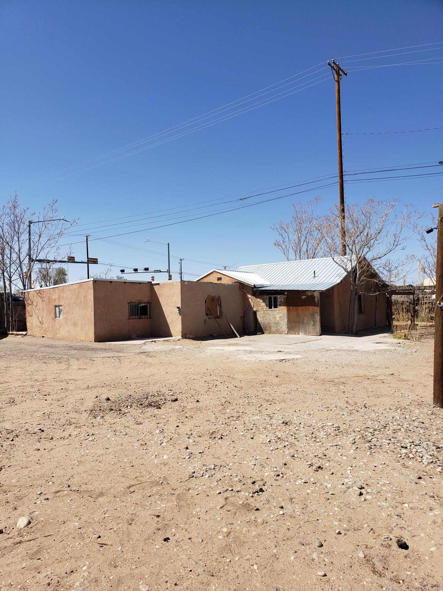 **Investor Special - South Valley**Approx. 1,200 sq ft, 2 bed / 2 bath home cleaned out and ready for renovation. Newer metal roof already in place. Large lot with room for expansion, outdoor living, or parking for boats/RVs/equipment. Located in a growing area near shops, restaurants, and entertainment. Great visibility--potential for home-based business or possible commercial use (buyer to verify zoning). Cash or hard money only--no owner financing. May qualify for FHA 203(k), VA renovation loan, or similar. **Sold As-Is.** Great opportunity for investors, flippers, or buyers building sweat equity!