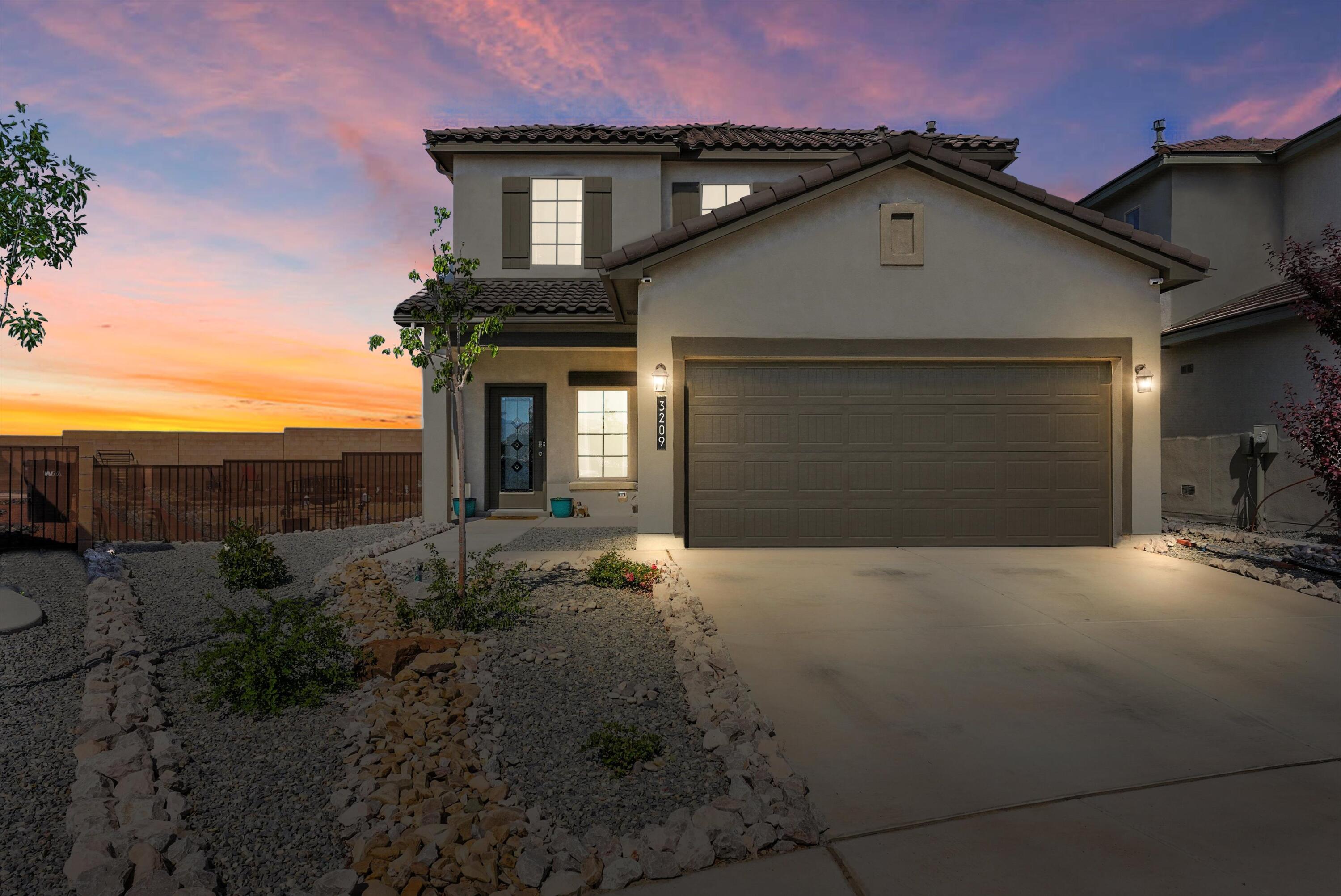 Welcome to luxury living in Los Diamantes, the area's newest and most sought-after community! Built in 2022, this pristine, non-smoking, pet-free home features hardwood-look tile floors, white easy-to-clean cabinets, quartz countertops, and a modern kitchen with a nearly new refrigerator. Bathrooms include cultured marble surfaces that are just as easy to maintain. The primary suite offers an oversized walk-in shower. Outside, enjoy a beautifully xeriscaped backyard with a fire pit, garden-ready beds, and no backyard neighbors. Includes gutters, extended block wall, and transferrable warranties. Immaculate and move-in ready!