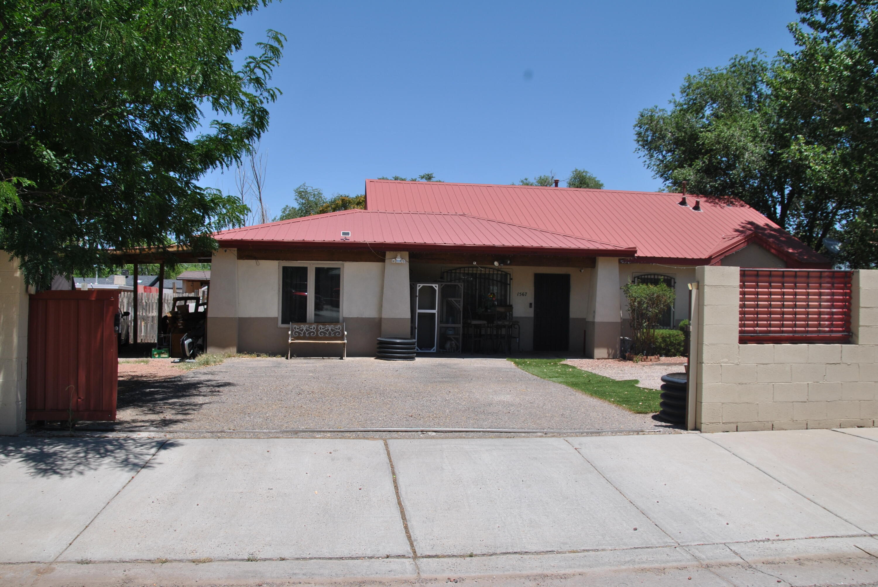 Charming 4 bedroom, 2 bath home in a quiet South Valley neighborhood. With almost a quarter of an acre, there is plenty of room for family and guests and added privacy of a corner lot.