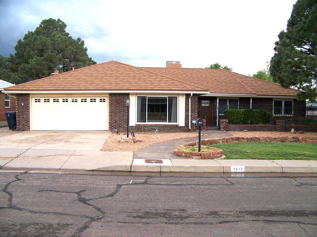 Beautiful 4 bdrm w/ remodeled kitchen - newer stainless steel appliances (refrig, dishwasher, double oven & built-in microwave), a 5 burner stove, 3 compartment sink, a wine cooler and informal breakfast nook.  The 20' x 20' den has a gas fireplace and mini bar.  There is a 8.8' x 13.5' formal dining area and a13.5' x 14.8' formal living room.  The main bedroom is 15.5' x 16.5' with a walk-in closet and an updated bath with walk-in shower.  There are two other bedrooms each measuring 11' x 14'.  The spacious hall bathroom has double sinks and a tub/shower combo.  The fourth bedroom is 11' x 8'.  The laundry room is 7.3' x10' and has shelving, clothes folding area, washer, dryer and a 1/2 bath.  Newer premium metal roof.  The backyard is gorgeous, has a shed and is fully landscped.