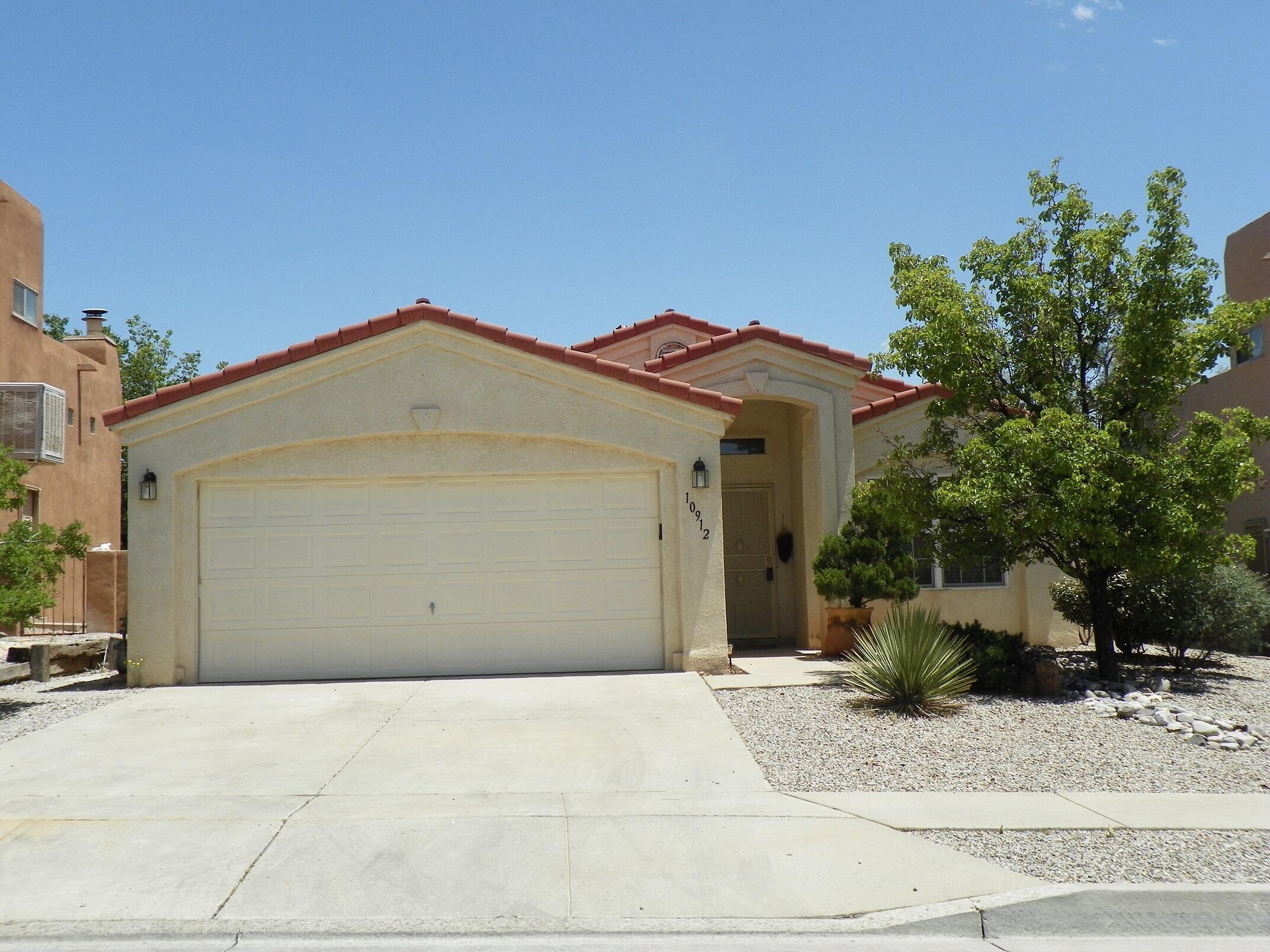 BEAUTIFUL 3-Bedroom, 2-Bathroom home located in desirable neighborhood at the south end of Rio Rancho off Highway 528 and Westside Boulevard.  Enjoy sitting on the private and quiet covered patio with a gorgeous view of the Sandia Mountains.  Living room has a wood burning fireplace.  Kitchen is very open and spacious with a breakfast nook eating area and a separate dining room.  Master bedroom has private entrance to the back patio.  Master bedroom has a separate shower, jetted bathtub, walk-in closet and dual vanities.  Laundry room comes with a nice washer and dryer set.  Refrigerated air for those hot summer days.  2-Car Garage has storage shelves.