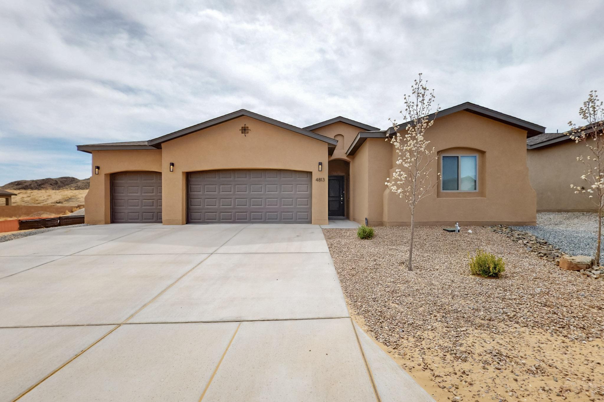 Don't miss out on this beautiful Abrazo 3 bed, 2 bath single story home with a 3 car garage & tandem for ample storage space!! This home has modern upgrades w/ thoughtful features! Enjoy year-round comfort with refrigerated air, a water softener, & a tankless water heater. The spacious kitchen is a chef's dream, showcasing a stylish new backsplash, recessed lighting, stainless steel appliances, & custom sleek white cabinetry, plus a handy work area off the kitchen. Great size yard w/ a solid block wall that ensures privacy in the backyard. No neighbors behind you! The home boasts a perfect blend of elegant tile flooring and cozy carpeting in the bedrooms. Schedule a showing with your favorite realtor today - this gem won't last long.