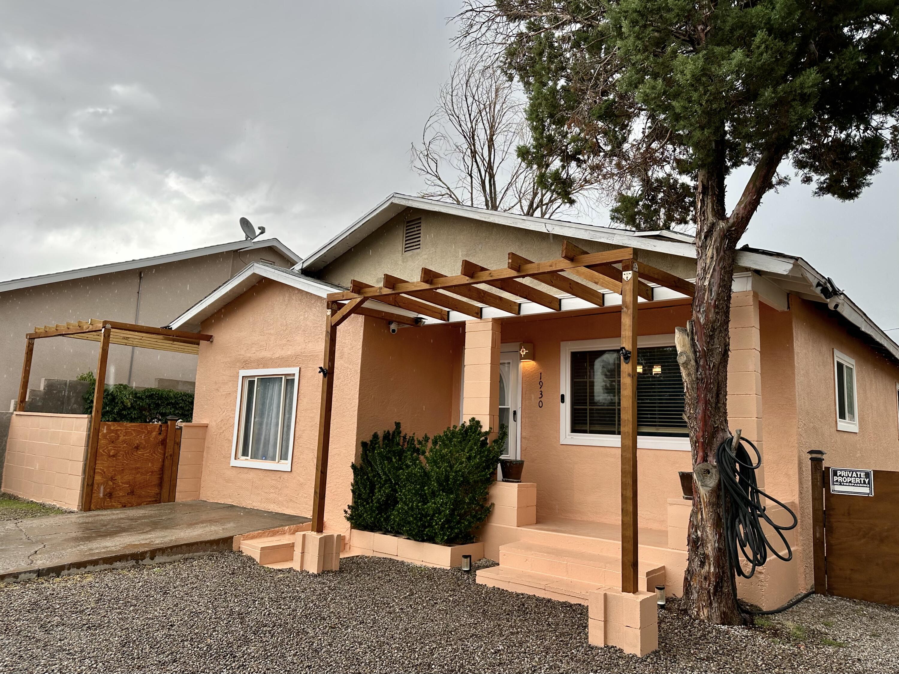 Great opportunity to own this beautiful craftsman style home close to downtown ABQ and the freeway, plenty of new restaurants within a mile radius. Backyard features a firepit area, a spacious covered BBQ area for all those summer family BBQ's and a garden area, has a RV parking area as well. Inside features new carpet in all bedrooms and livingroom. Primary bedroom features a spacious walk in closet with built in shelving. All new lighting and fans throughout the home. Exterior has all new paint and interior has been painted as well. Don't miss this opportunity to schedule a showing today