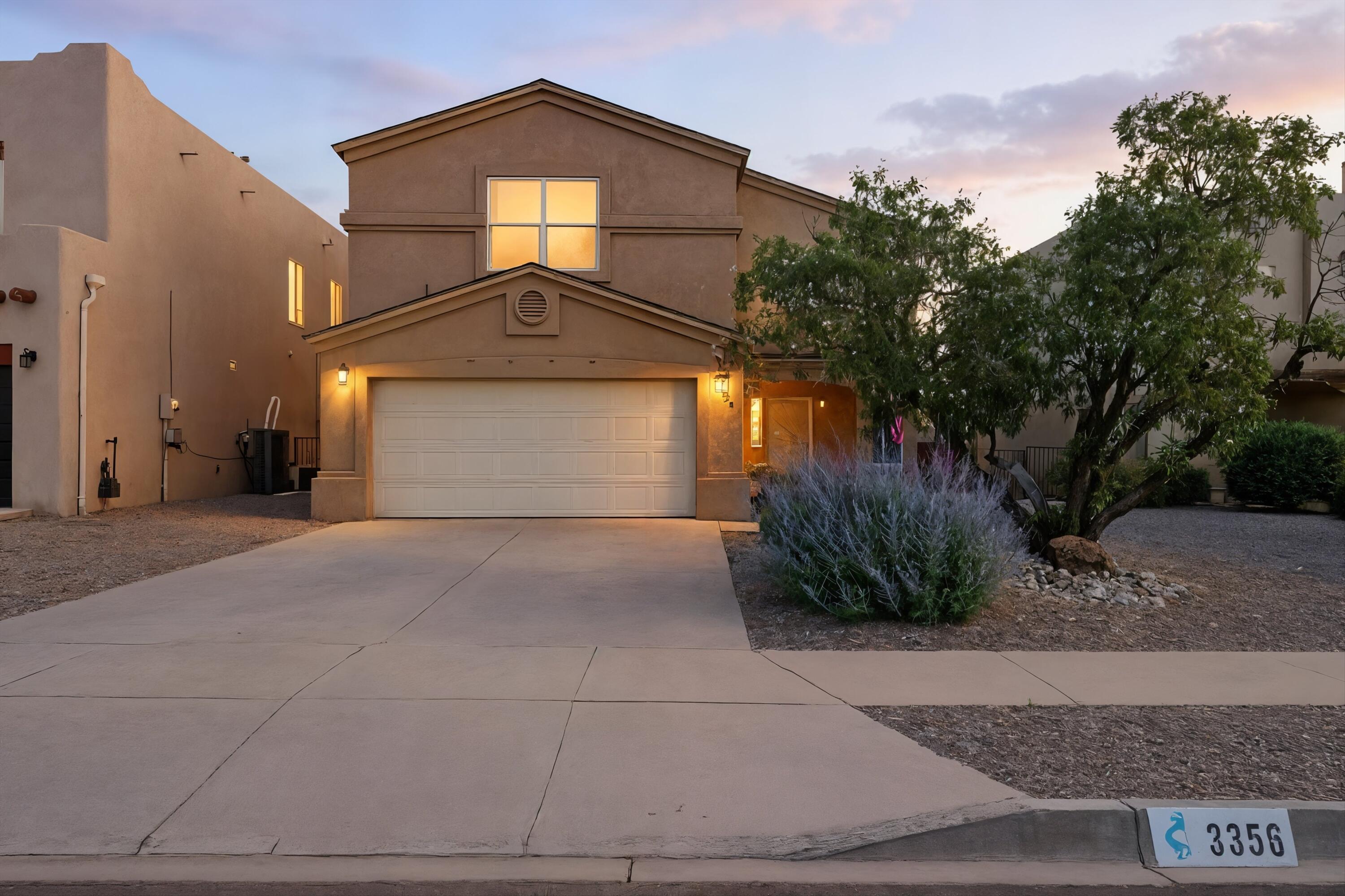 Breathtaking views, gorgeous layout, location and space! The modern kitchen is the heart of this beautiful abode featuring granite countertops, plenty of cabinet space and black SS appliances & ALL APPLIANCES CONVEY! The downstairs living area is perfect for entertaining with two spacious living rooms and a breakfast bar. Upstairs you'll find a 300+ square foot loft perfect for a game room or an office. The primary bedroom has ample space and gorgeous views from the patio. Step outside into your private oasis, perfect for relaxation and entertaining with no neighbors behind, gorgeous views of the Sandia Mountains and front row seats to the fireworks display in Rio Rancho. Close to the RR Event Center with shopping, dining, walking trails and parks throughout this beautiful neighborhood.