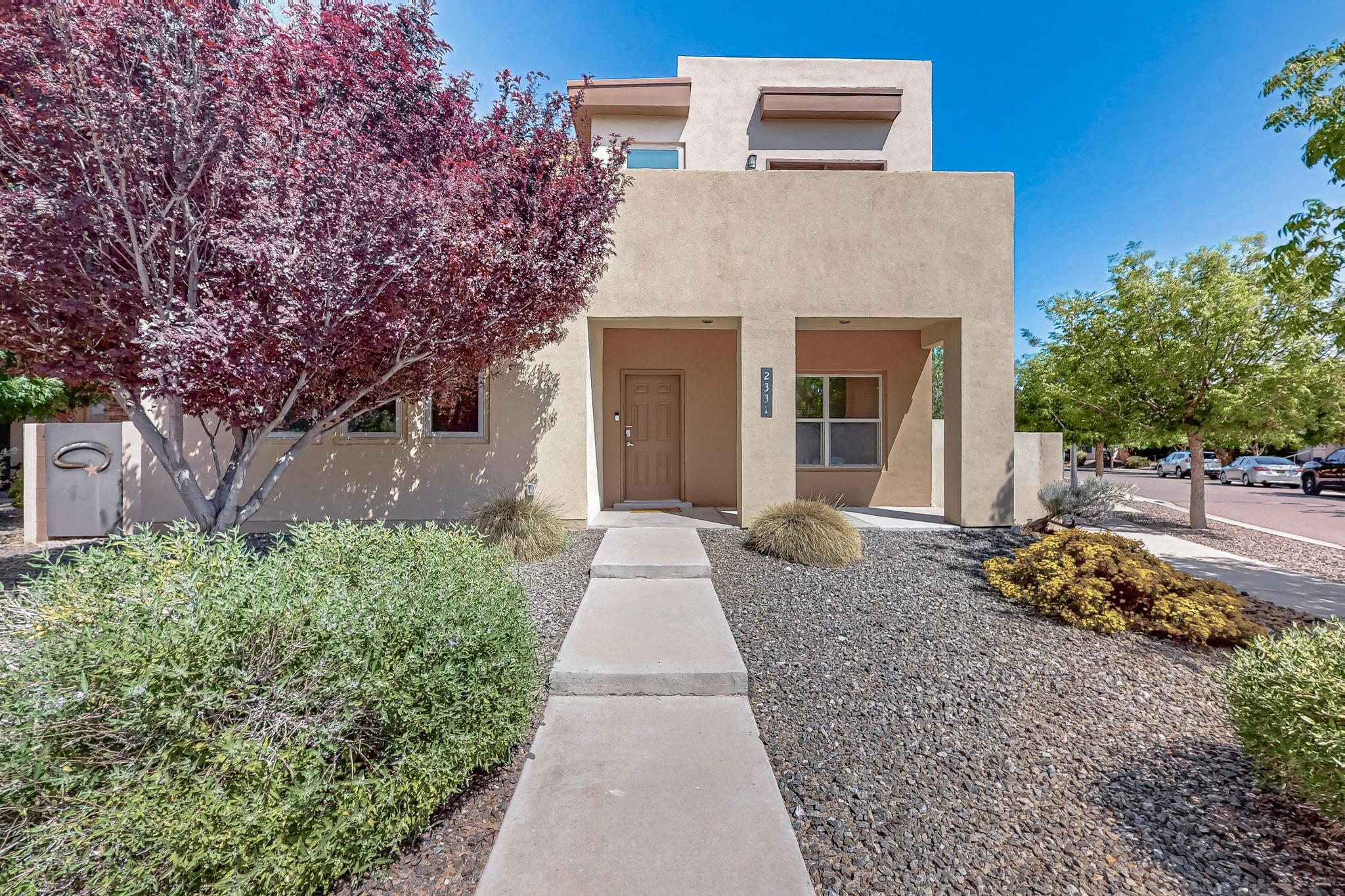 Say hello to your next adventure in the heart of Mesa del Sol! This fun and functional 3-bedroom gem offers two spacious living areas, a cozy covered back patio for sunset hangouts, and a 2-car garage for all your gear. Out front, enjoy a shared grassy yard with just two friendly neighbors, zero mowing required! You're just minutes from Netflix Studios, I-25, and the airport, making life a breeze. Dive into the community pool, groove at Music in the Park, and soak up the neighborhood vibe. Bonus: it's currently listed as an Airbnb--hello, income potential! Come live where the energy is fresh and the future is bright!