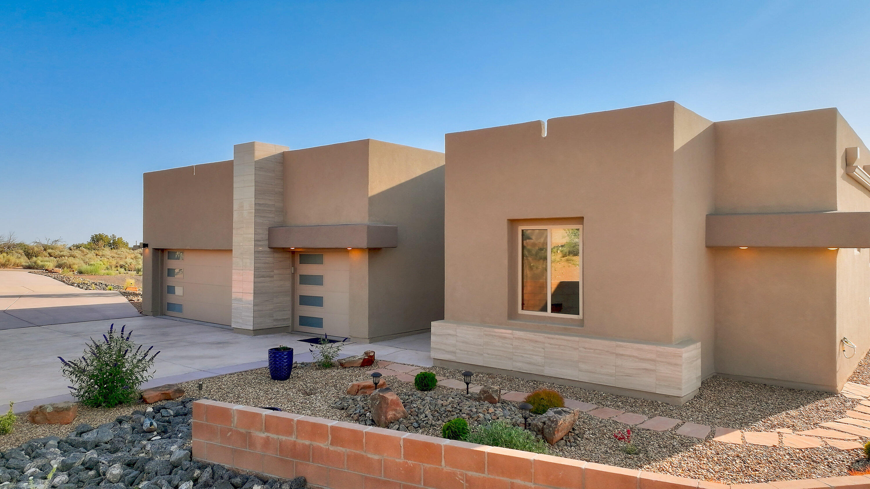Magical Mariposa Luxury Estates. Large lots. https://liveinmariposa.com/ Forever space & VIEWS. This custom modern luxury one level contemporary shows like a model home. Immaculate & upgraded thru out. Large  1+acre view lot. Professional landscape design. Deep wide driveway. Enclosed landscaped back yard with large entertainers covered patio.  Large covered portico entry with custom front door. Private foyer opens to  light & bright floorplan with raised ceilings & floor to ceiling views in living area & view windows thru out. Dramatic great room with raised beam ceiling, lighting package with fan, tile flooring  & custom fireplace. Gourmet kitchen  with lots of custom cabinets & quartz counters, quality ss appliances, pantry,& entertainers bar. Formal dining room with view windows.